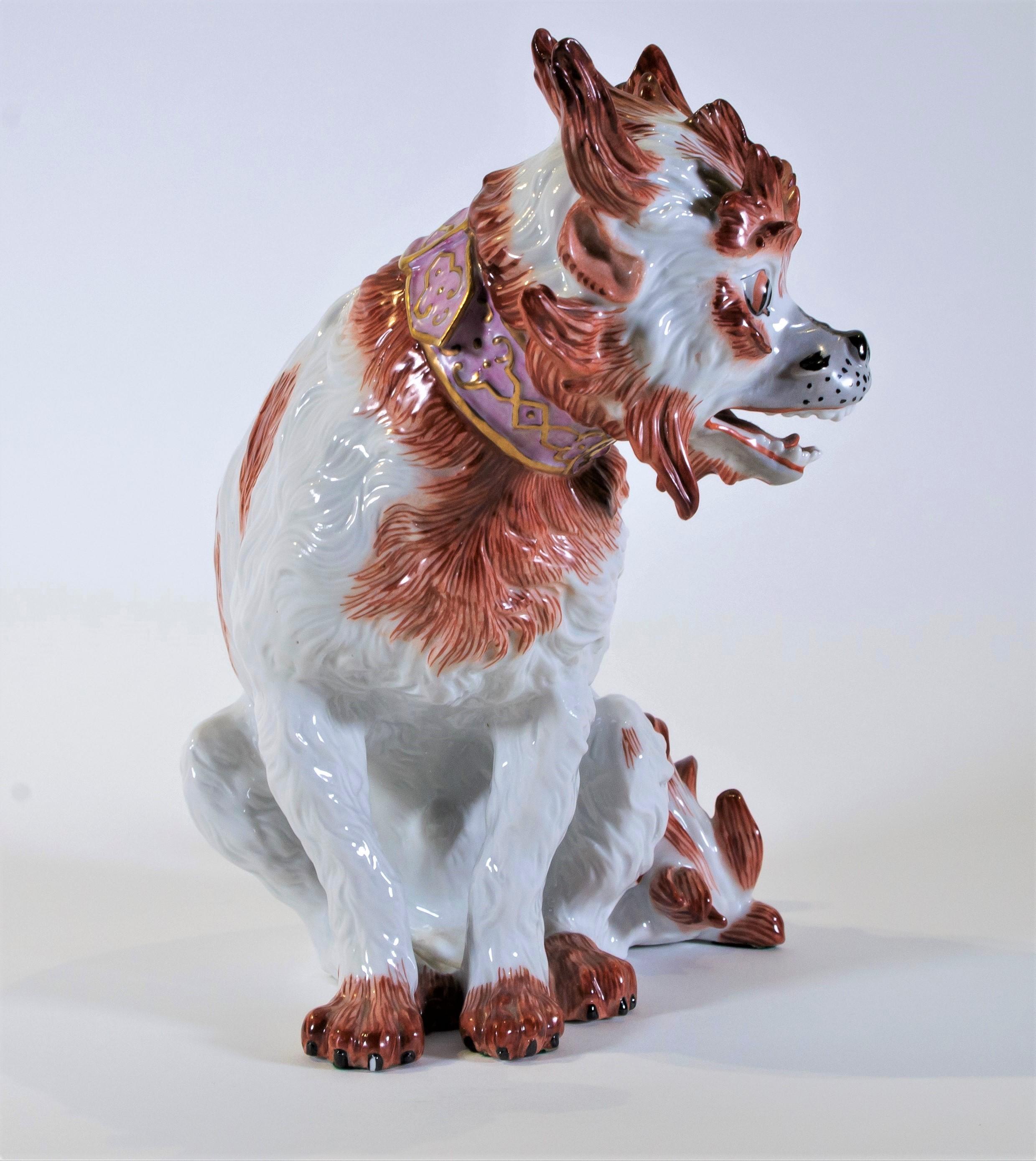 A fabulous antique 19th century porcelain model of a bolognese dog, signed Deresden in Underglaze blue mark, After the Original Meissen Model by Johann Gottlieb Kirchner. The dog is painted with a beautiful white coat with reddish/orange spots and