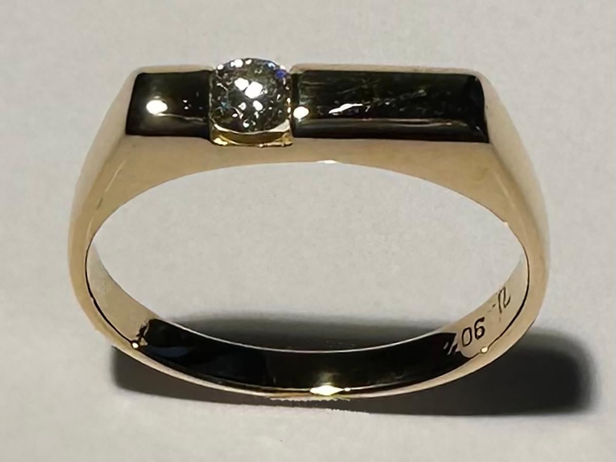 This is an Antique 20kt Yellow Gold ring made in Thailand with a 3.5mm diamond channel open set in the top of the band. This lovely ring is sized 5.75 US and is perfect for a young girl or very petite finger.