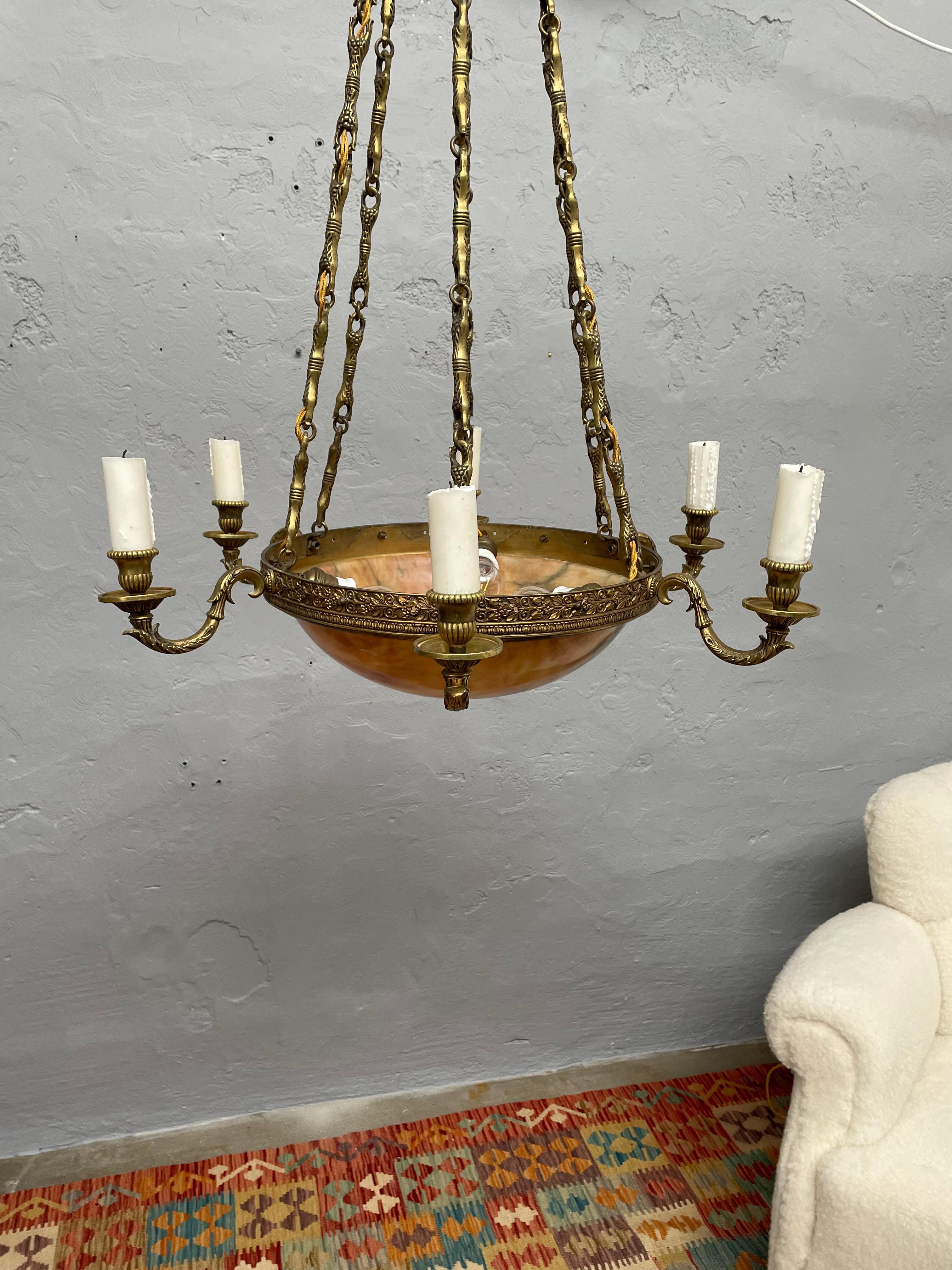 Large antique alabaster plafonnier chandelier candelabra from the 1920s . 
Of Swedish origin and in great condition. 
This amazing pendant has been cleaned and rewired with twisted gold cloth flex. 
There has been fitted a grounding point in the