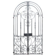 An Vintage Arched Wrought Iron Garden Gate