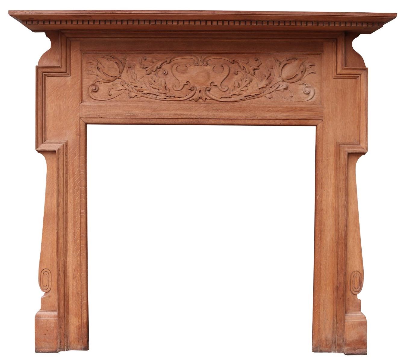 An English Art Nouveau period fireplace with stylised carved floral frieze panel.

Additional Dimensions:

Opening Height 97 cm

Opening Width 95 cm

Width between outside of foot blocks 141 cm.