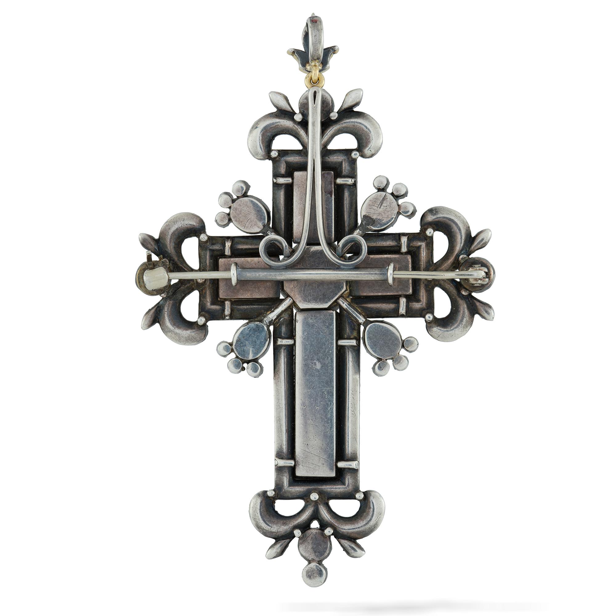 A Georgian beryl and diamond cross brooch, in the form of a stylised Latin cross set with ten faceted colourless beryls coloured with pink foil backs, surrounded by rose-cut diamonds, all set in silver with a silver brooch fitting and a detachable