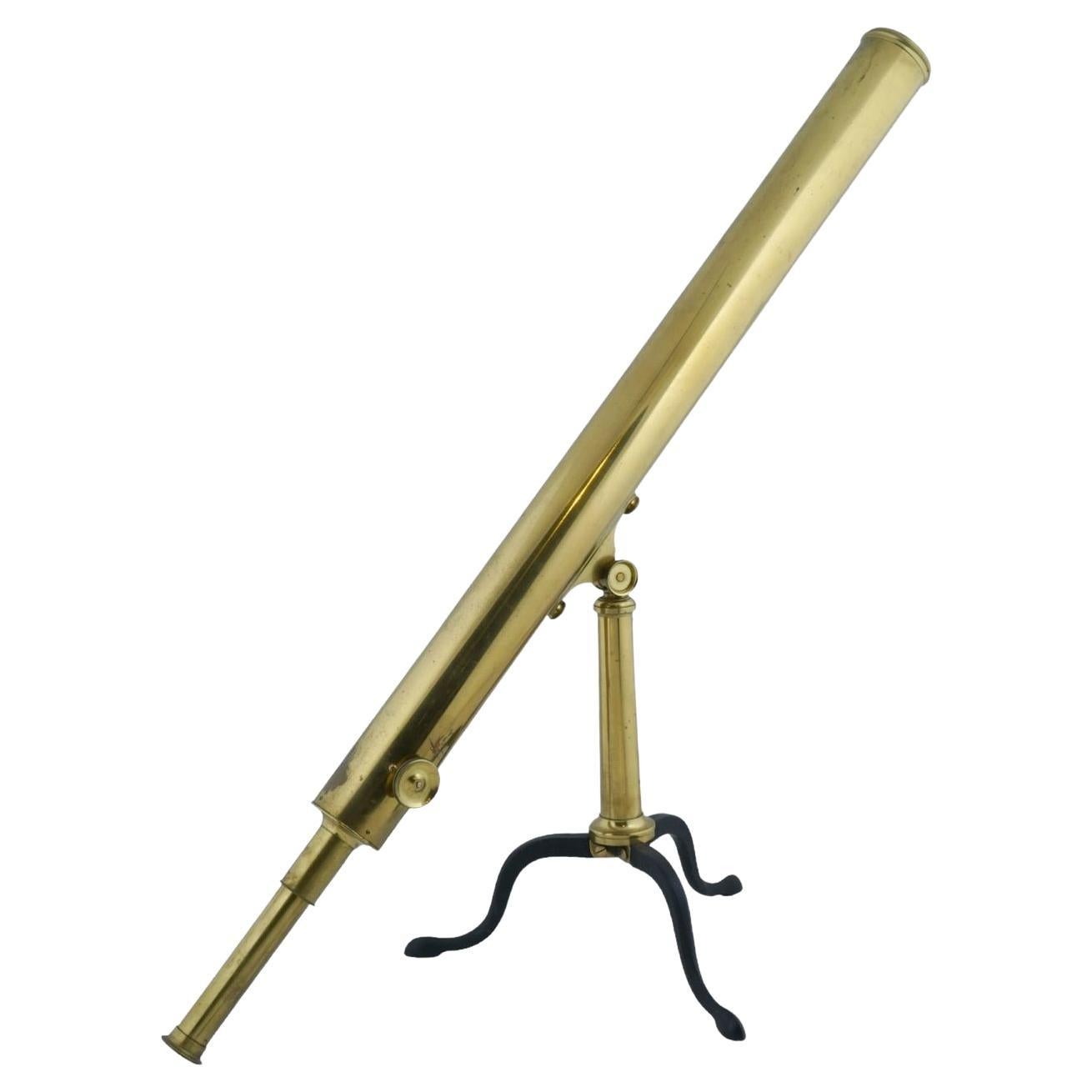 An Antique Brass Library Telescope With Tripod