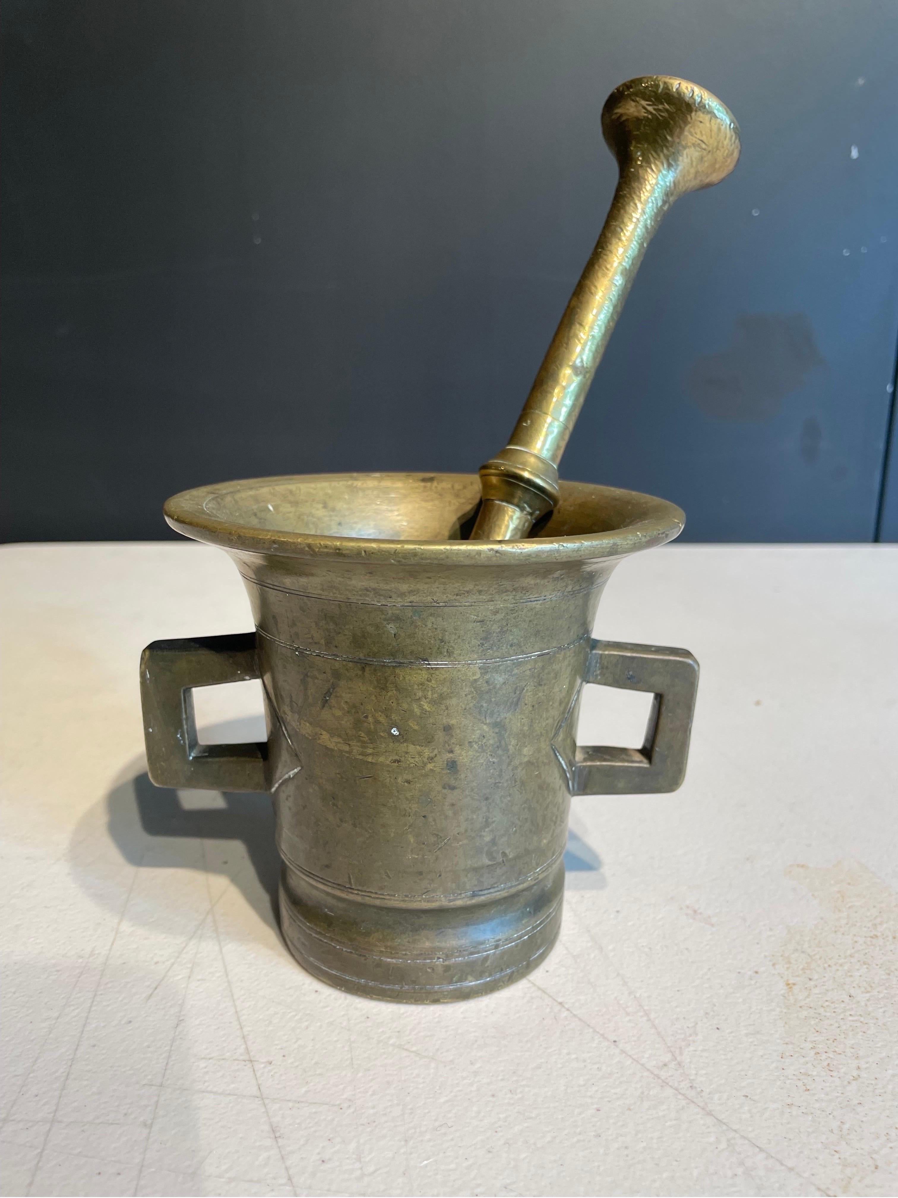 Cast An Antique Brass Mortar with Pestle, 19th Century For Sale