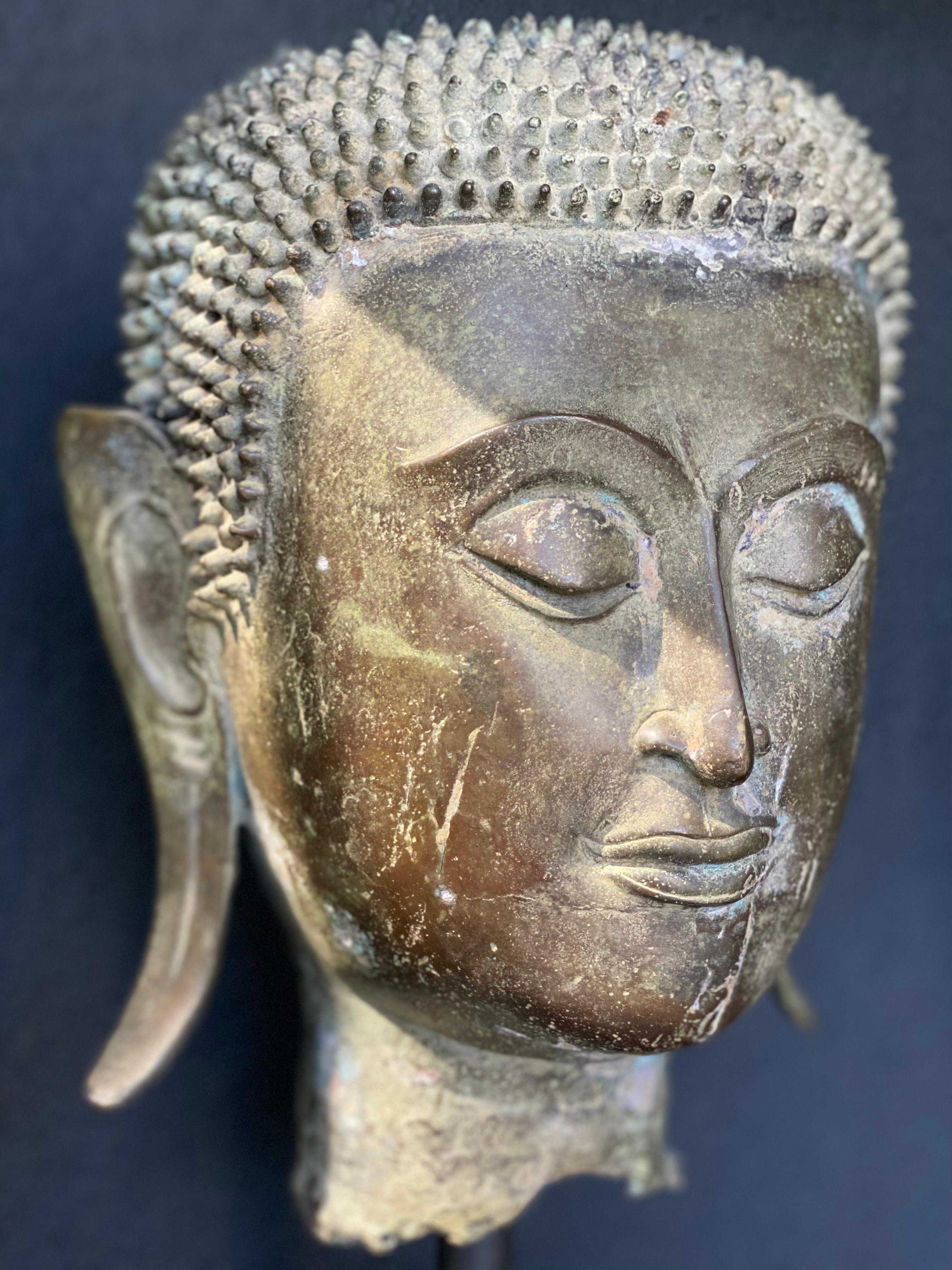 An antique Bronze Buddha Head 4