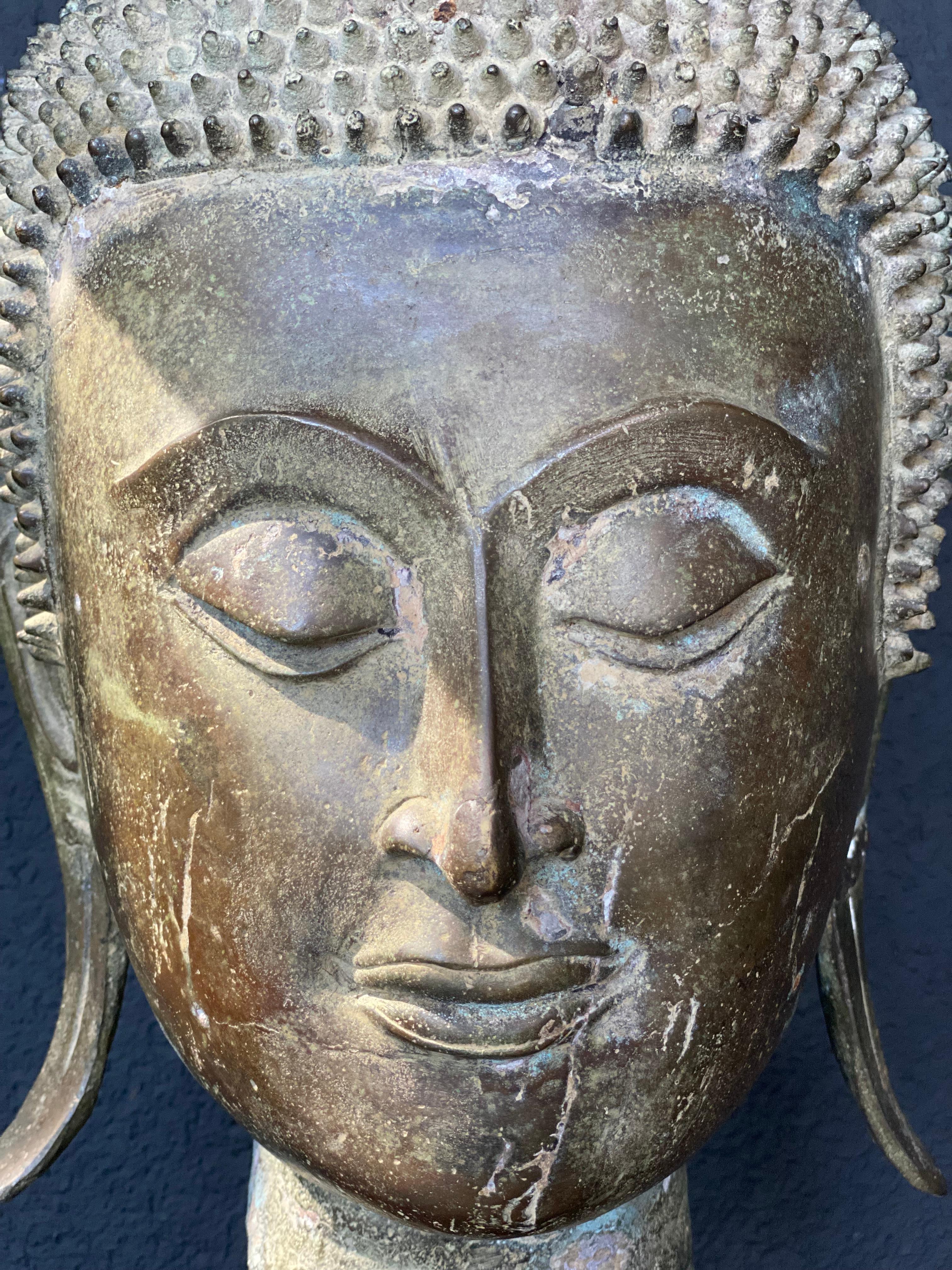 An antique Bronze Buddha Head 6