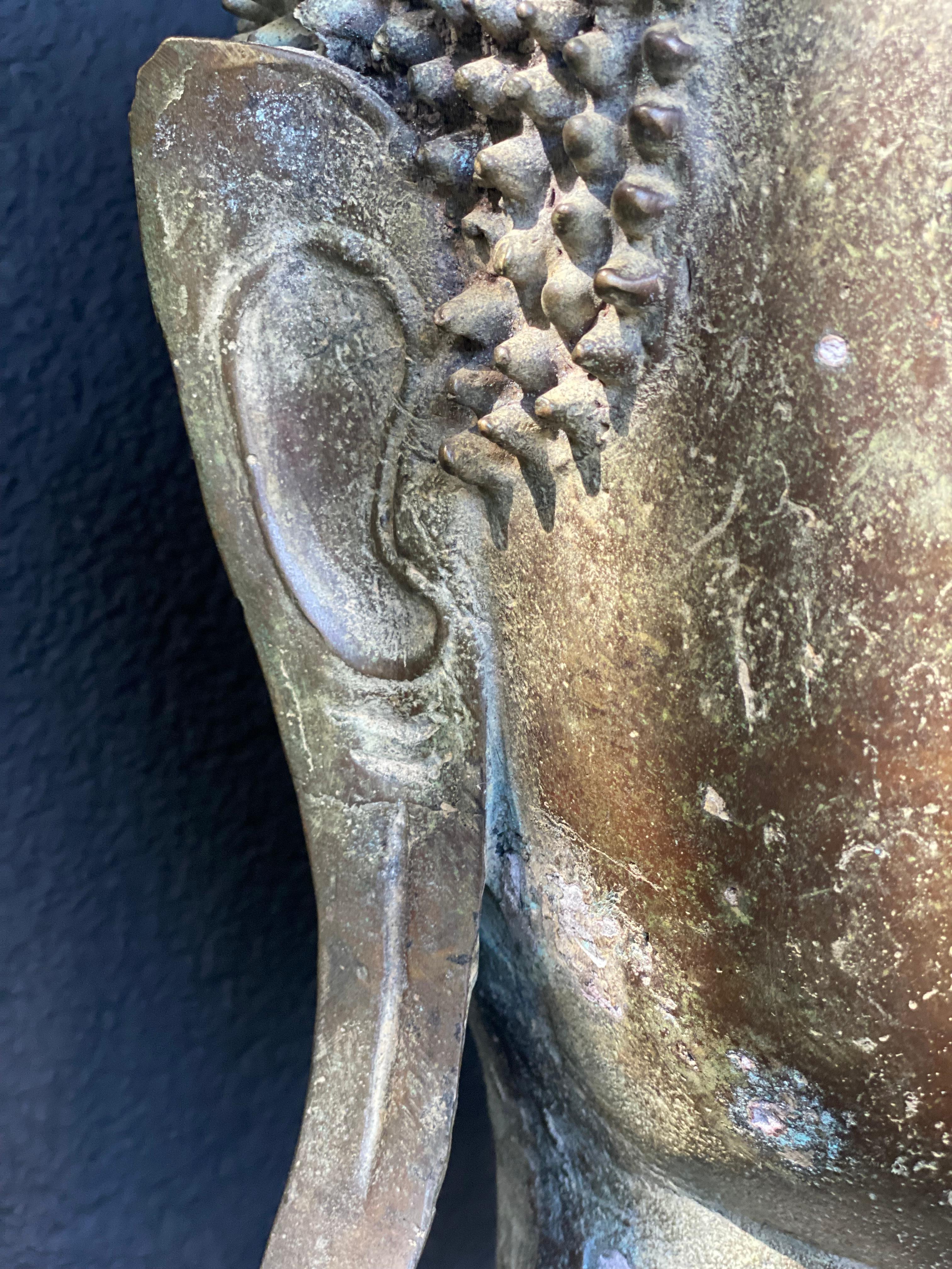 An antique Bronze Buddha Head 7