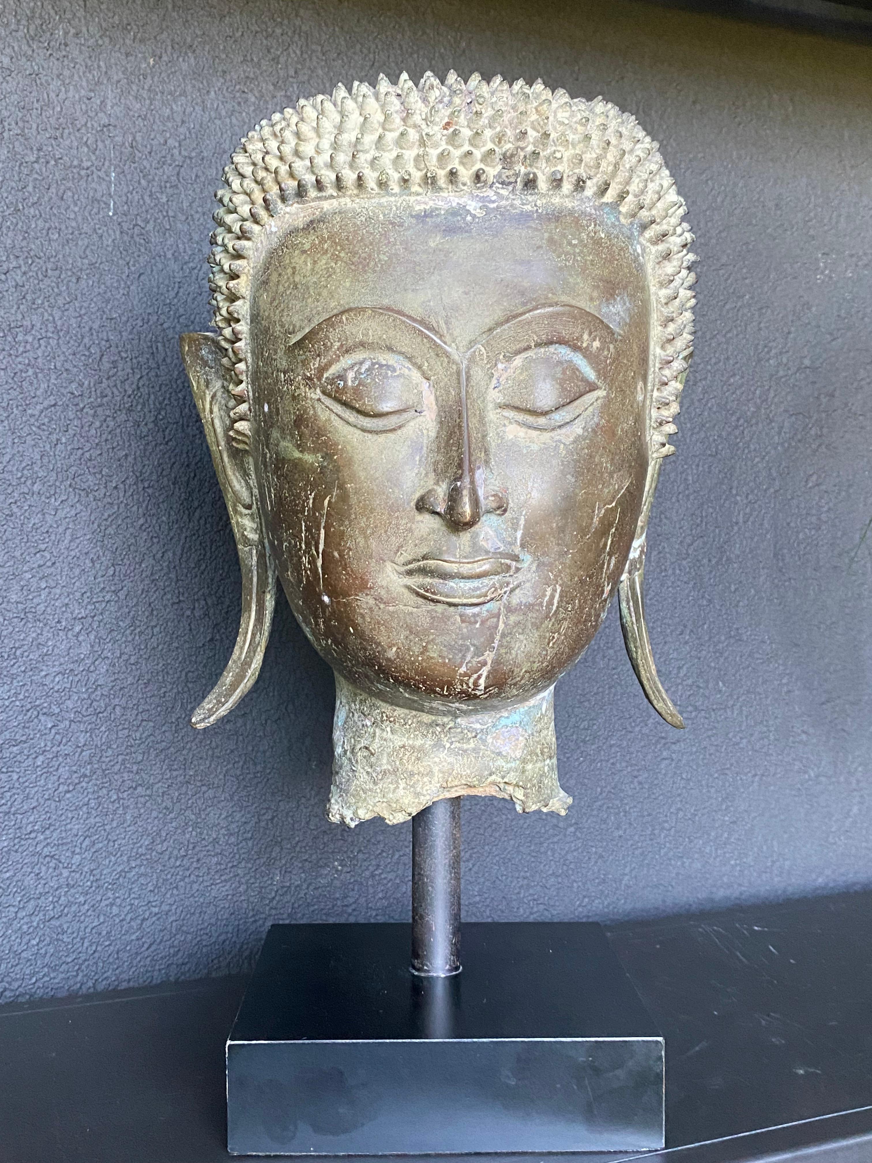 An antique Bronze Buddha Head 11