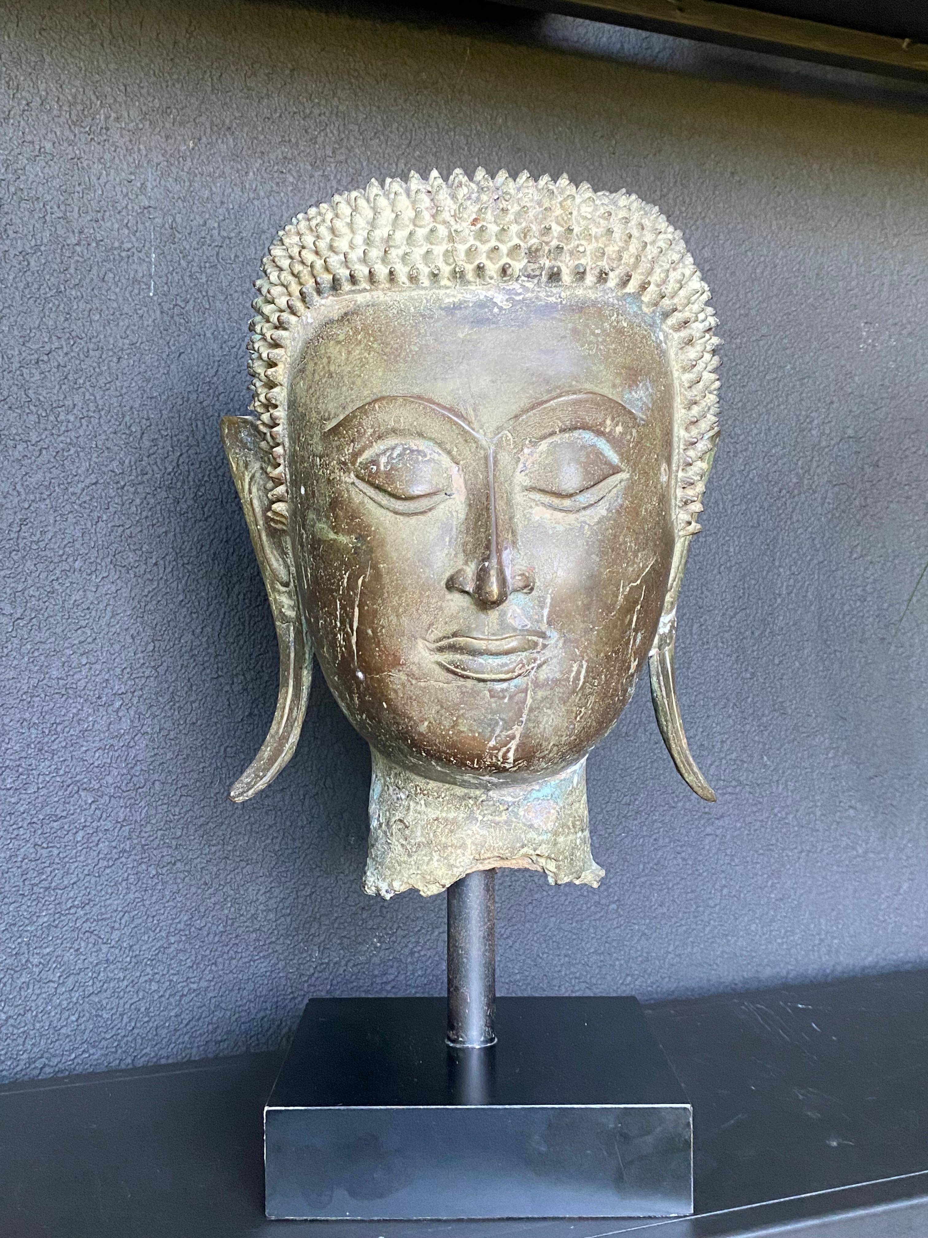 An antique Bronze Buddha Head 12