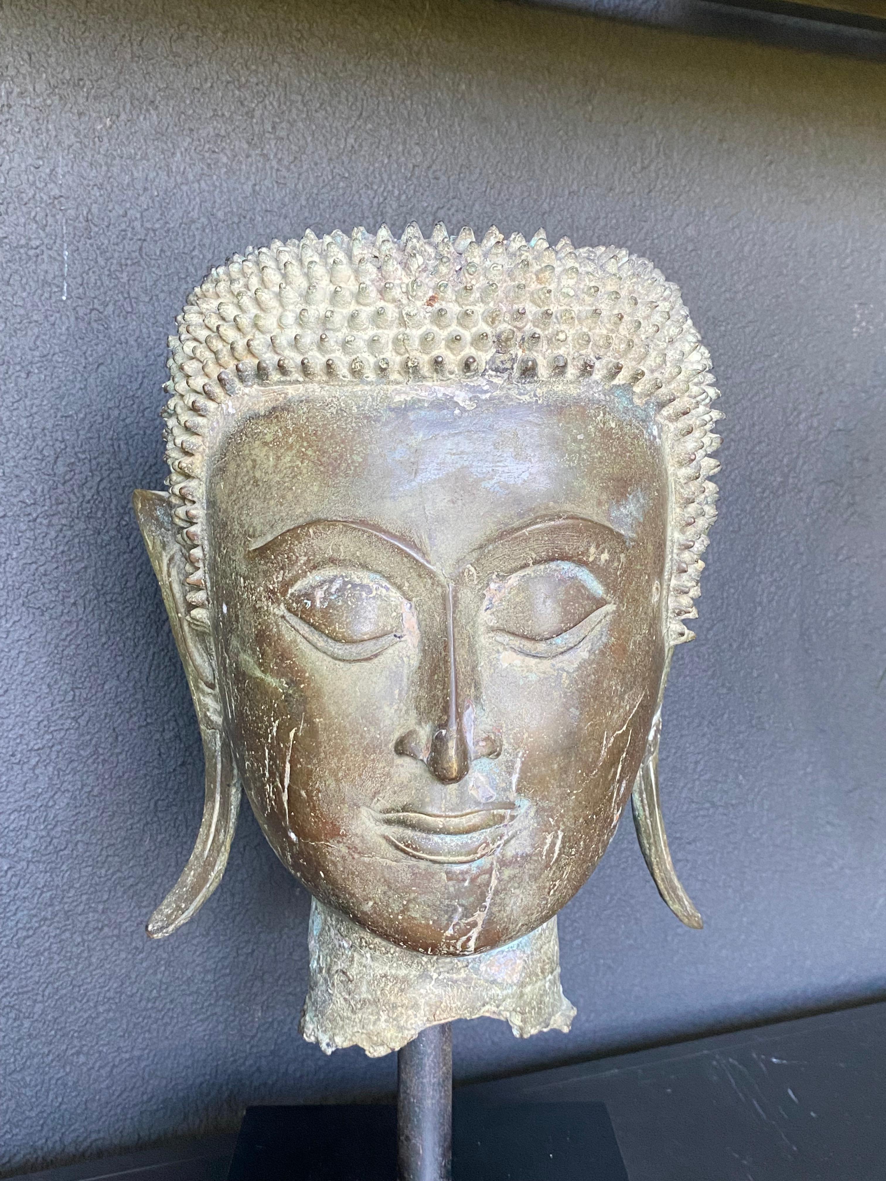 An antique Bronze Buddha Head 13