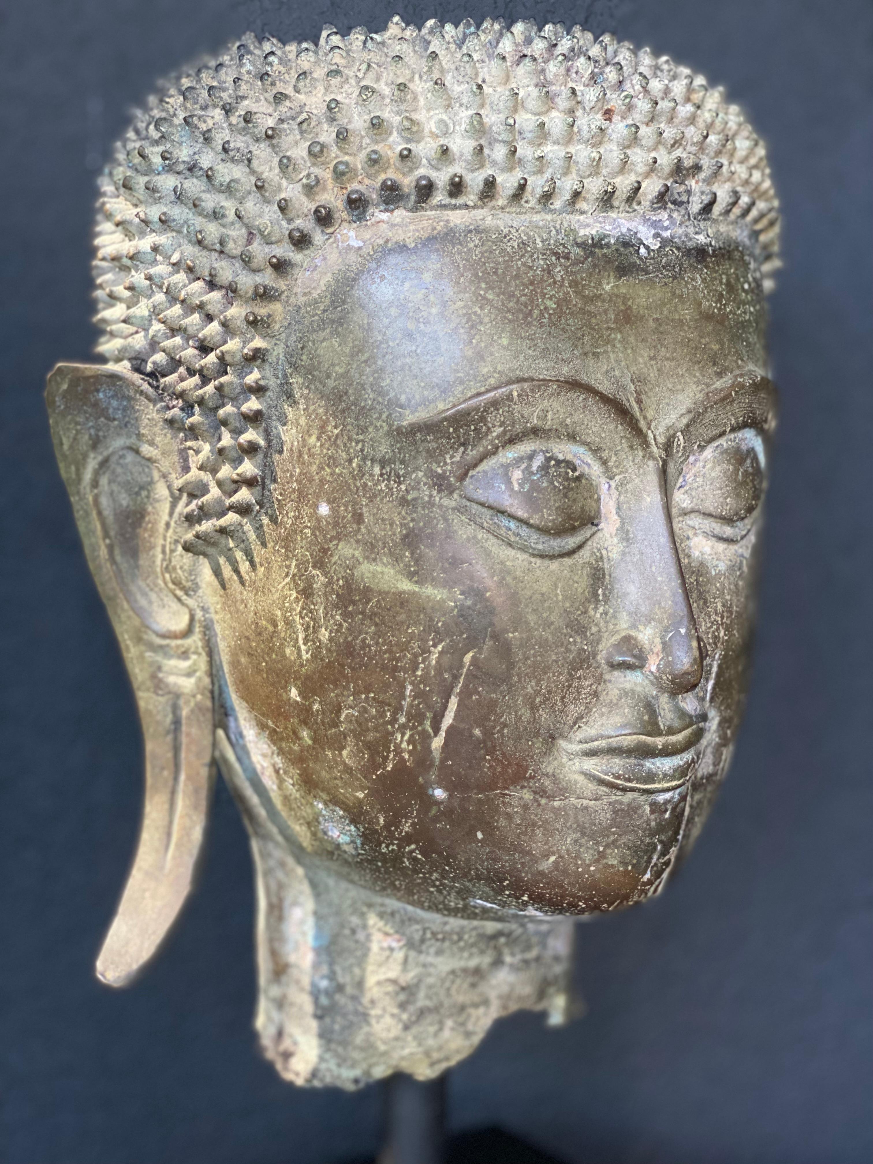 Mid-19th Century An antique Bronze Buddha Head