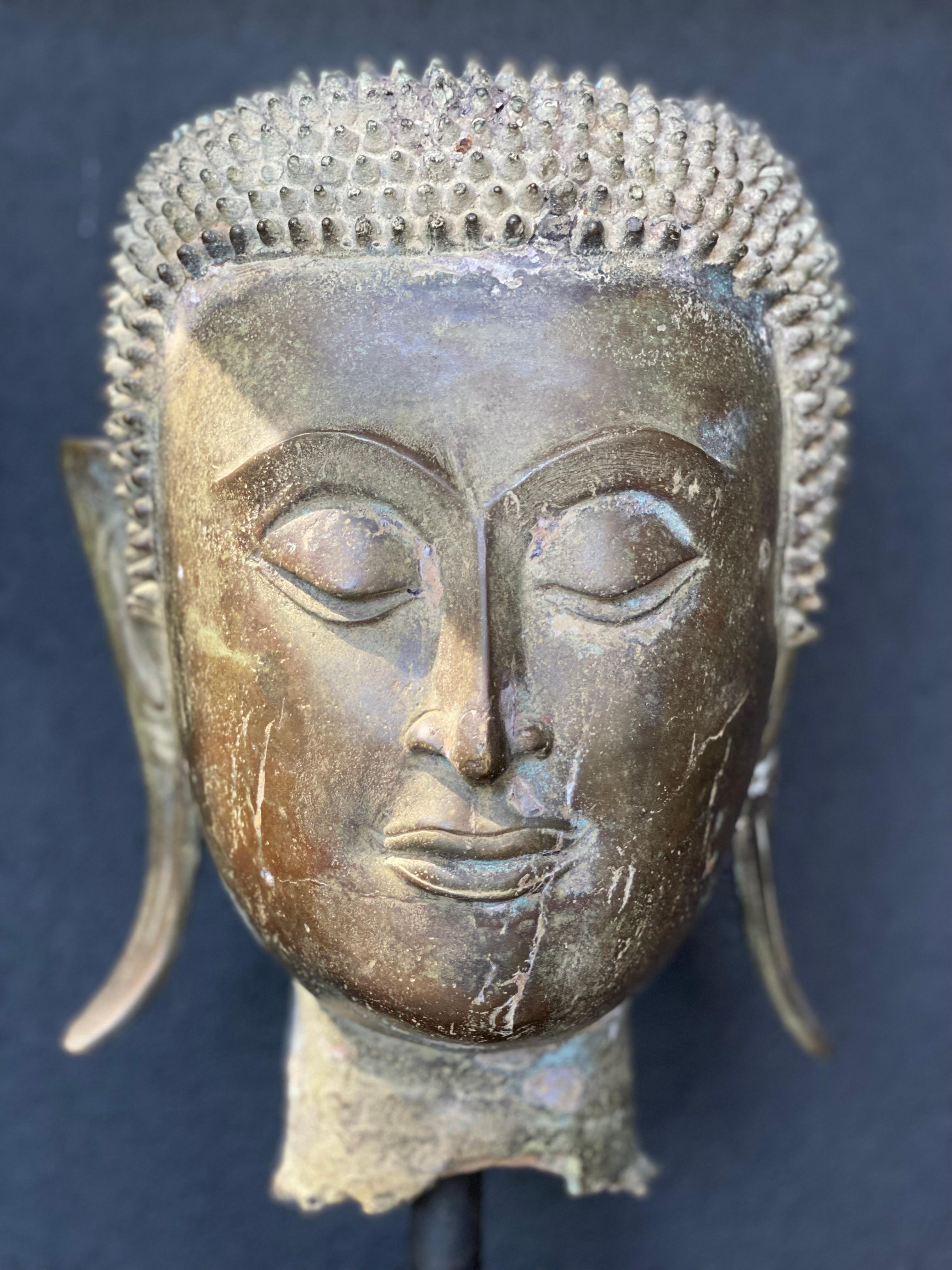 An antique Bronze Buddha Head 3