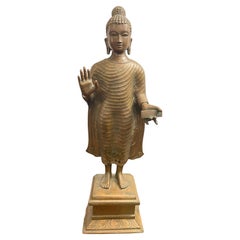An Antique Bronze Figure of a Standing Buddha, 19th Century