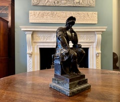 An antique bronze figure of Lorenzo De Medici, after Michelangelo