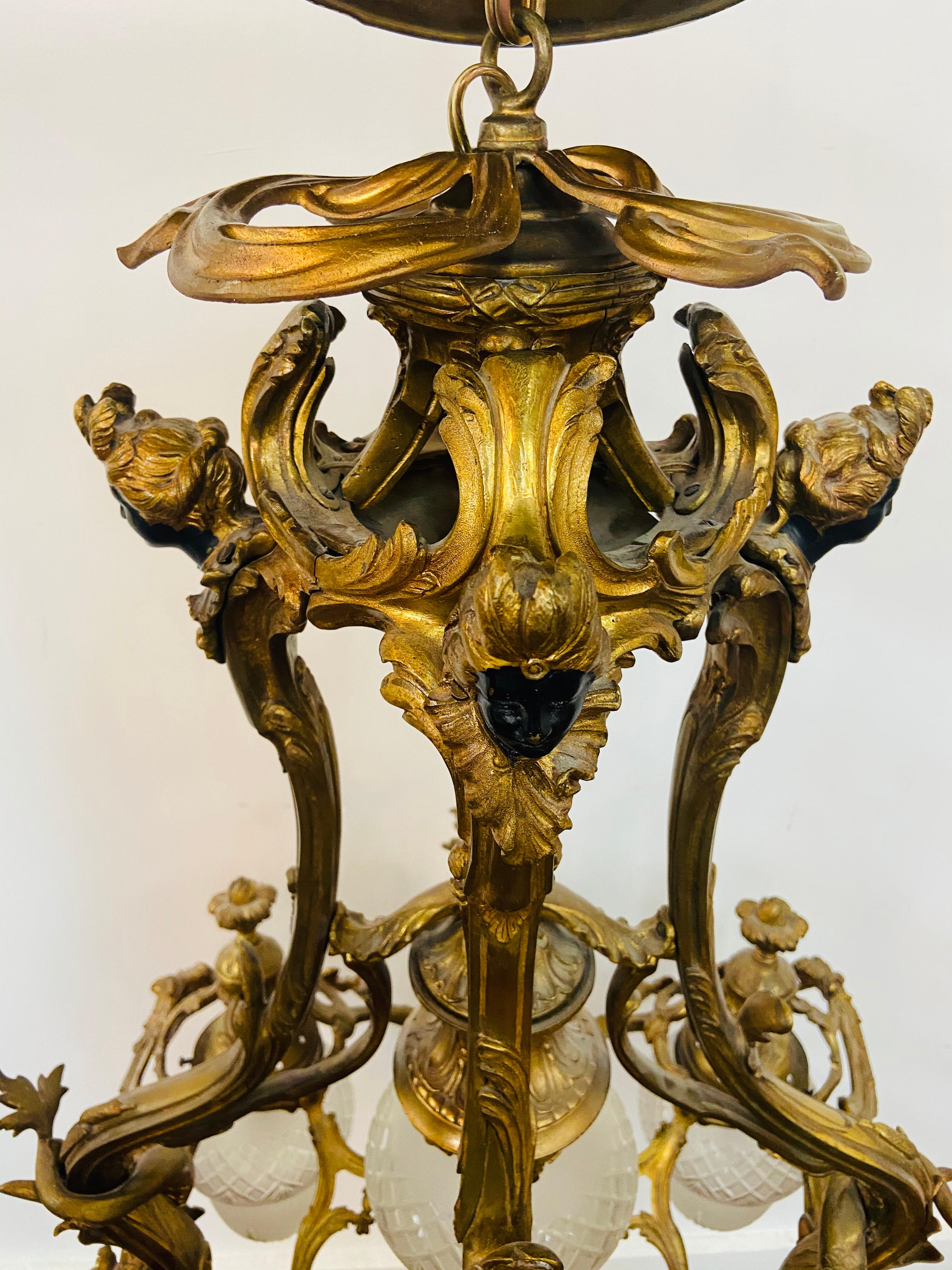 Antique Bronze French Louis XVI Chandelier with Women Heads Design 4