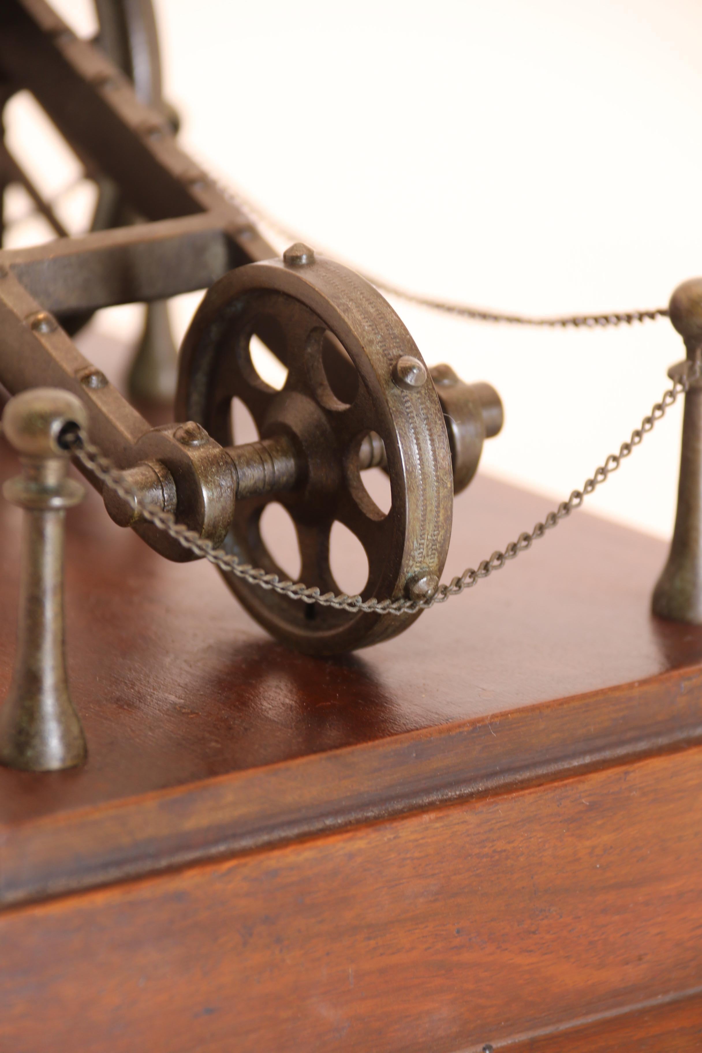 An antique bronze scale model of an 18th century cannon on a hardwood base c1920 For Sale 4