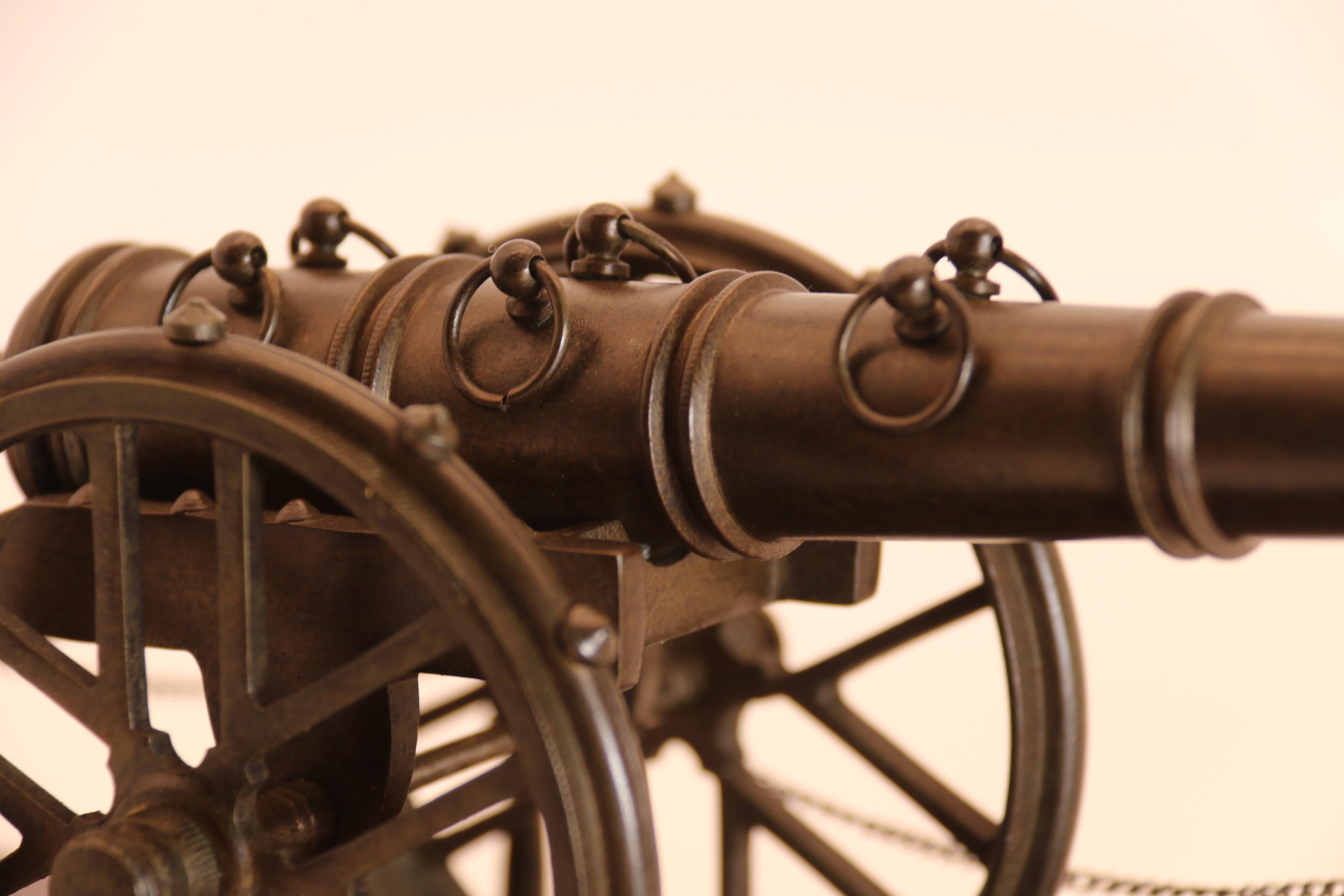 An antique bronze scale model of an 18th century cannon on a hardwood base c1920 For Sale 7