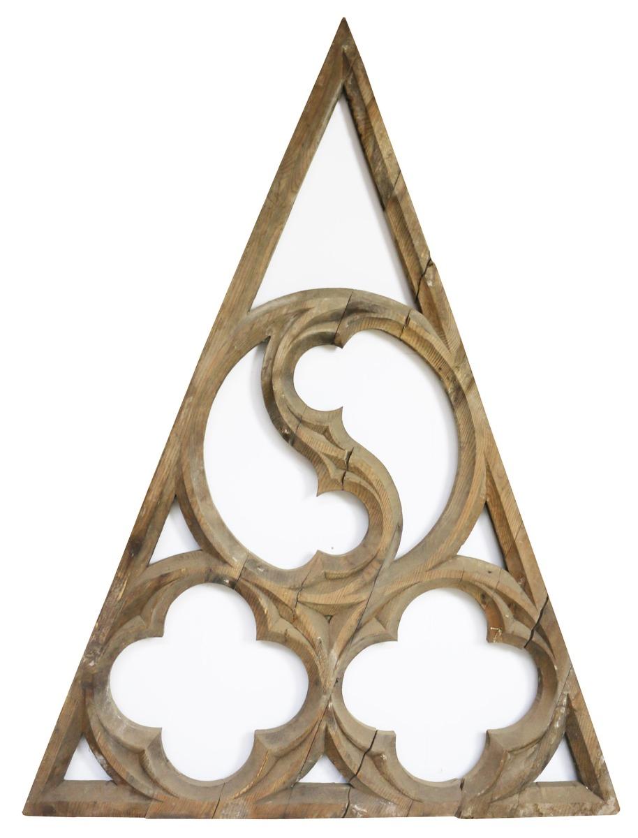 A hand carved pine tracery panel. Measurements are excluding temporary frame. (frame not shown in images). Carved with quatrefoil, cusp and mouchette decoration. Carved both sides.