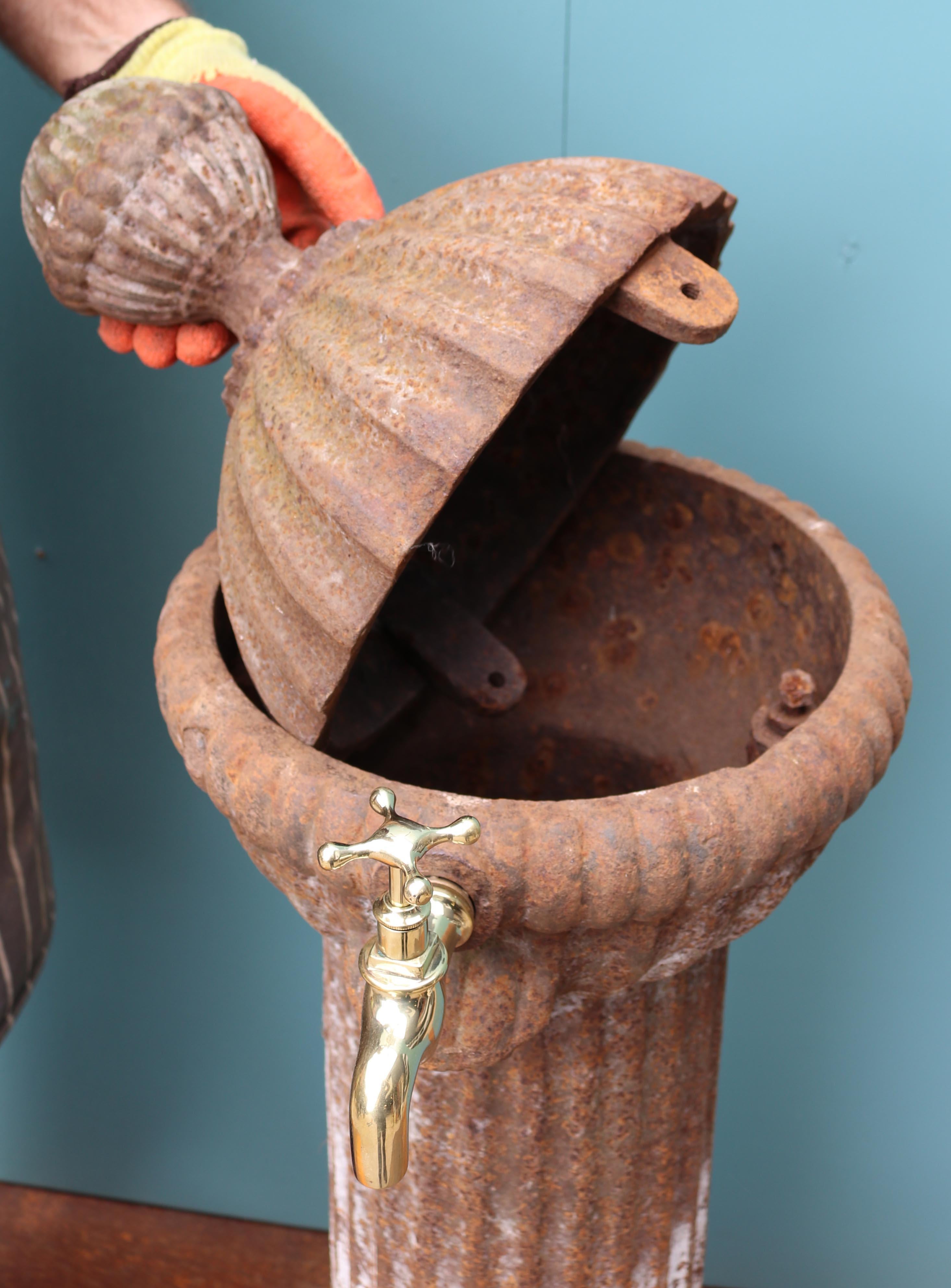 An unusual cast iron water spout fitted with a brass tap. Originally a village well pump.

Additional Dimensions:

Above ground 104 cm

Distance between tap and grate 58 cm

Base 41 cm x 41 cm.