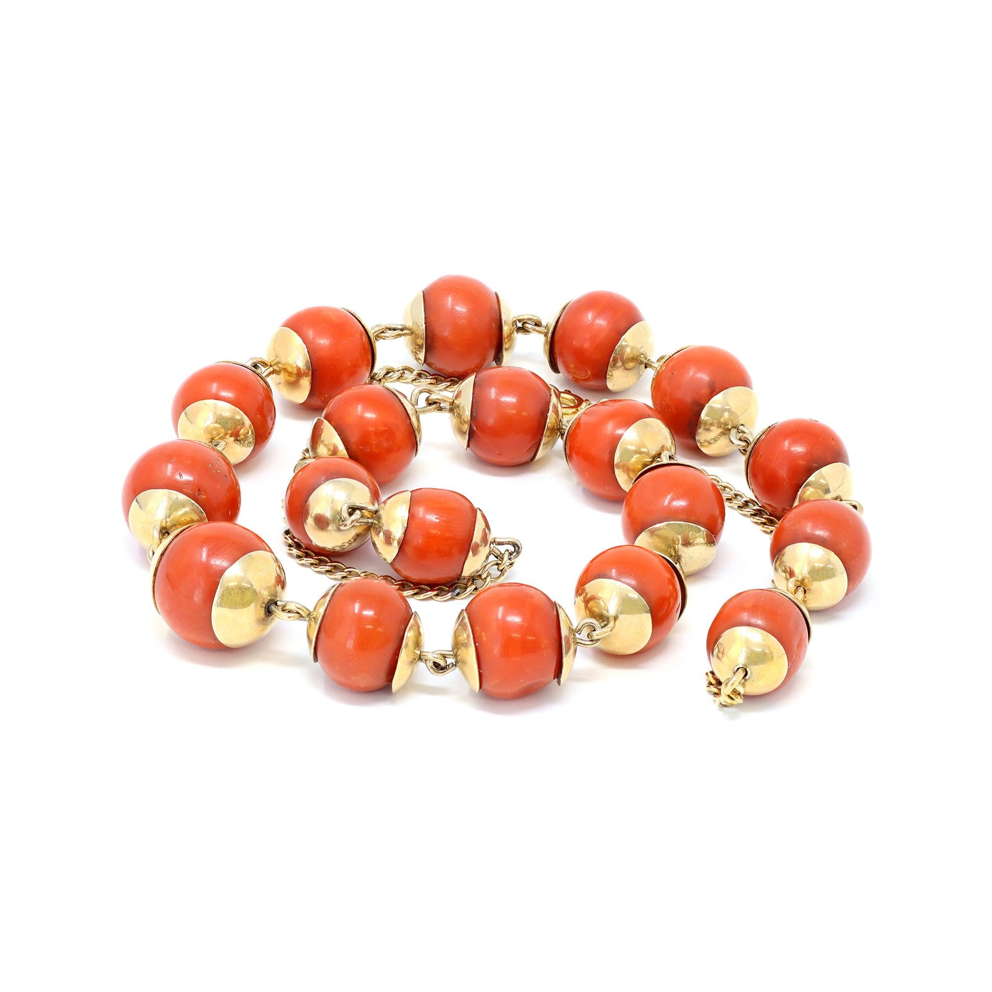 A classic antique coral bead station necklace circa 1900. The coral beads haver a deep red hue, near round shape, measuring 10-12 millimeter. The coral is natural untreated with no indication of dye. The gross weight is 17.5 grams. It measures 19”