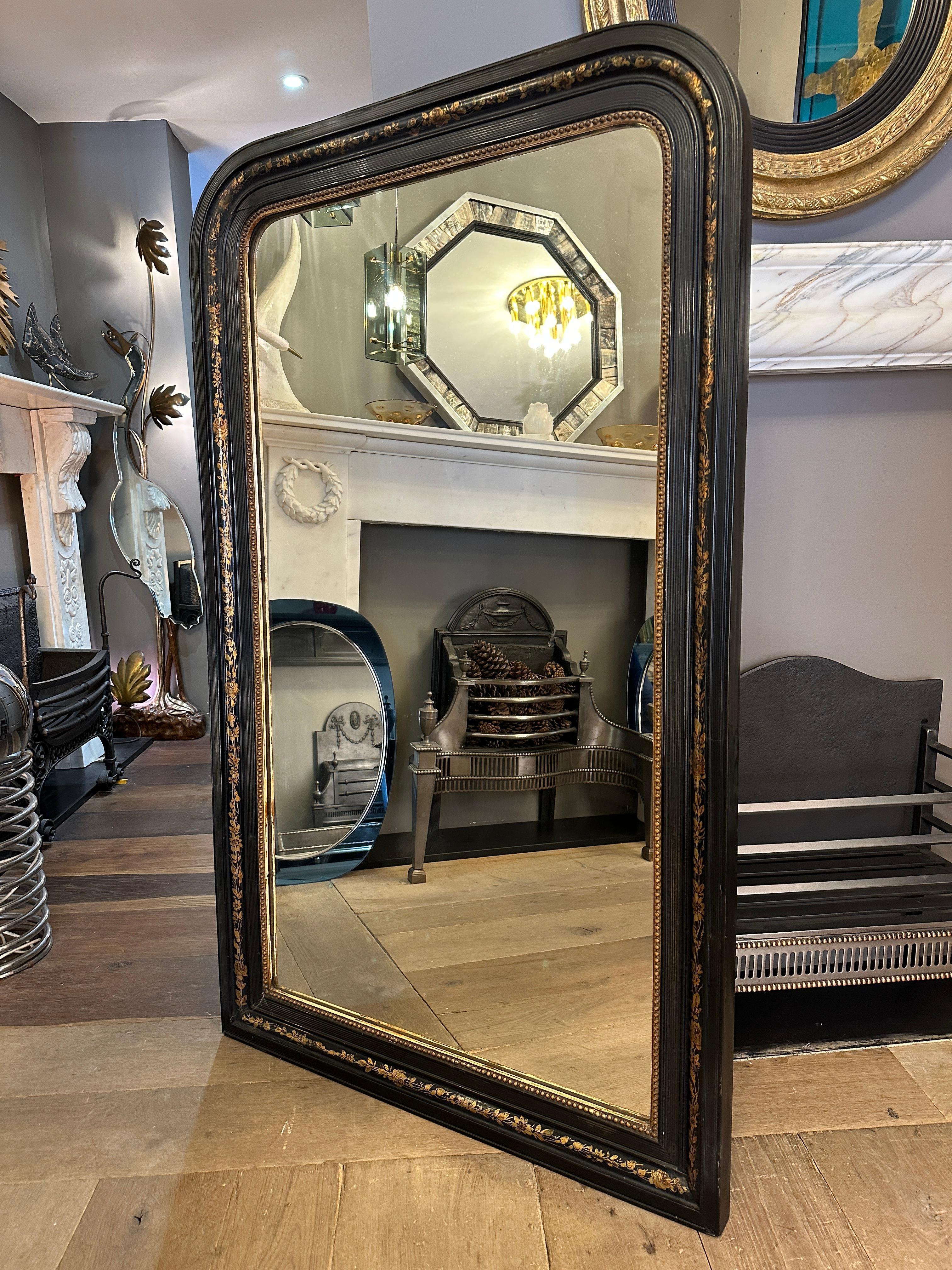 An Antique Domed Topped Ebonised And Gilt  French Mirror 1