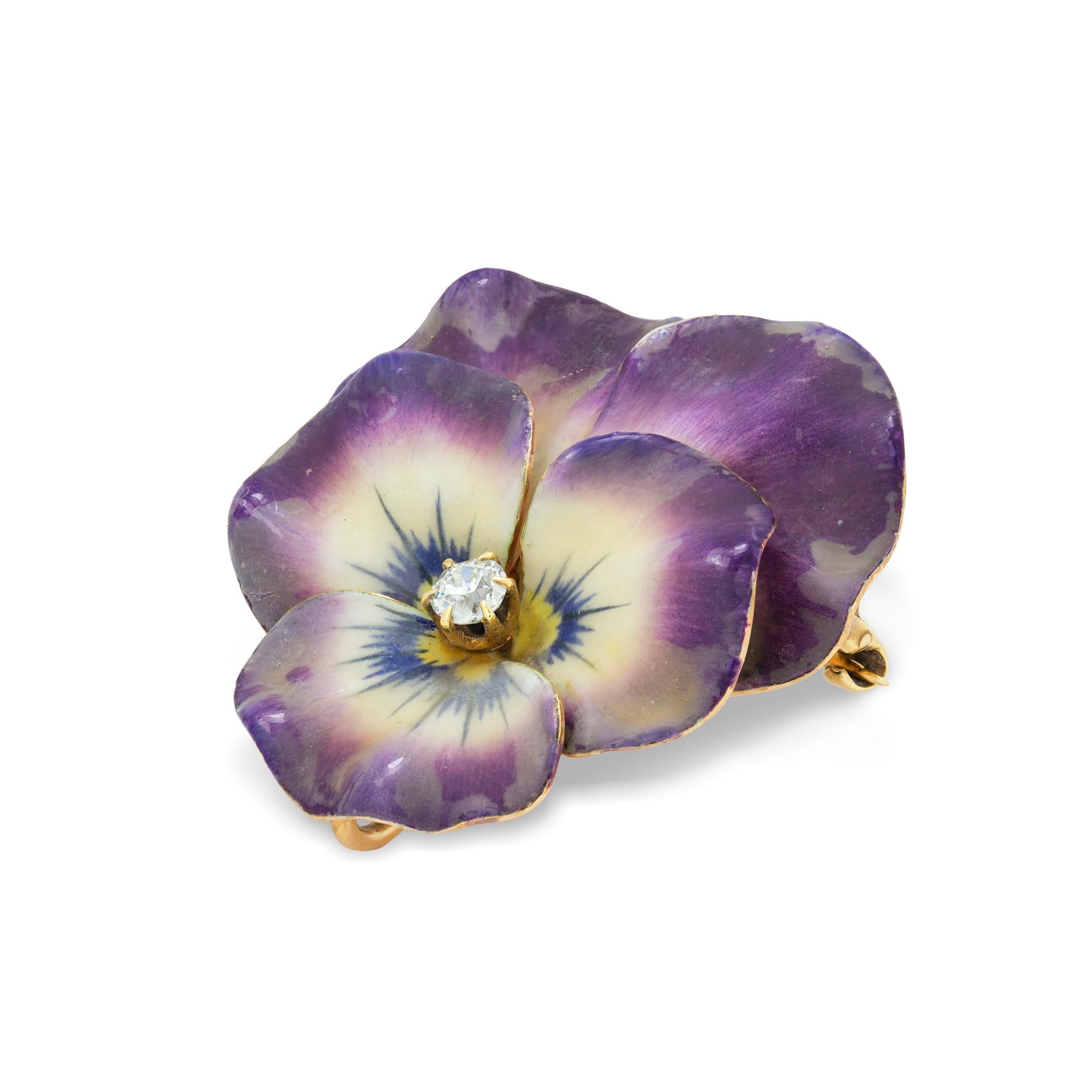 An antique enamel and diamond pansy brooch, the old-cut diamond estimated to weigh 0.25 carats claw-set to the centre of five realistically carved and enamelled petals with a14ct  yellow gold back with brooch and foldable pendant fittings, made in