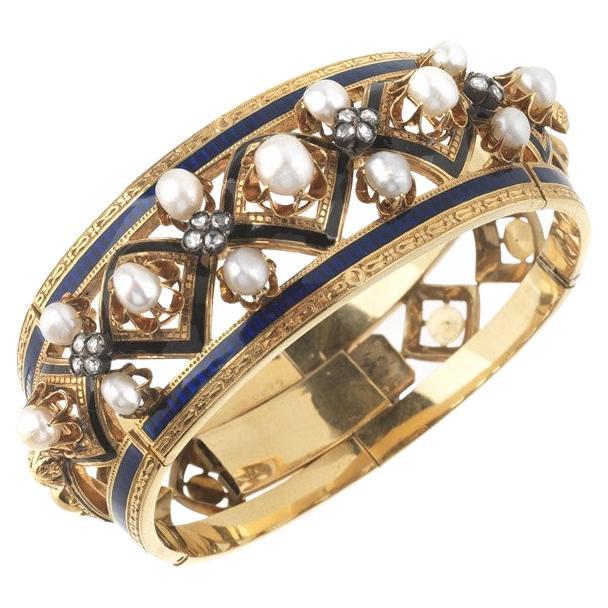 An Antique Enamel Pearl Diamond And Gold Bangle Bracelet Circa 1880  For Sale