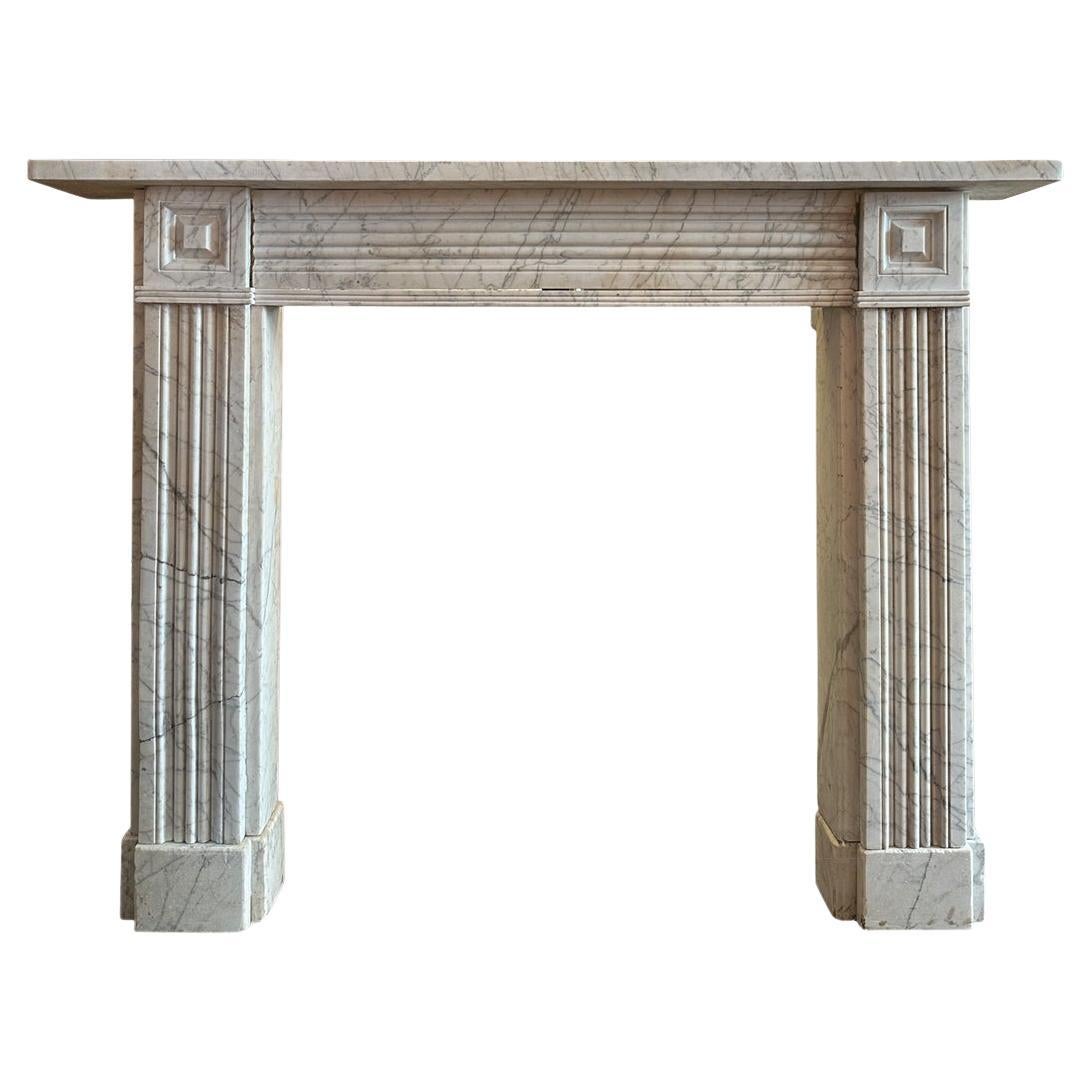 An Antique English Early 19th Century Regency Marble Fireplace Mantel
