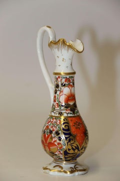 An antique English mid 19th century porcelain hand painted Derby ewer circa 1860