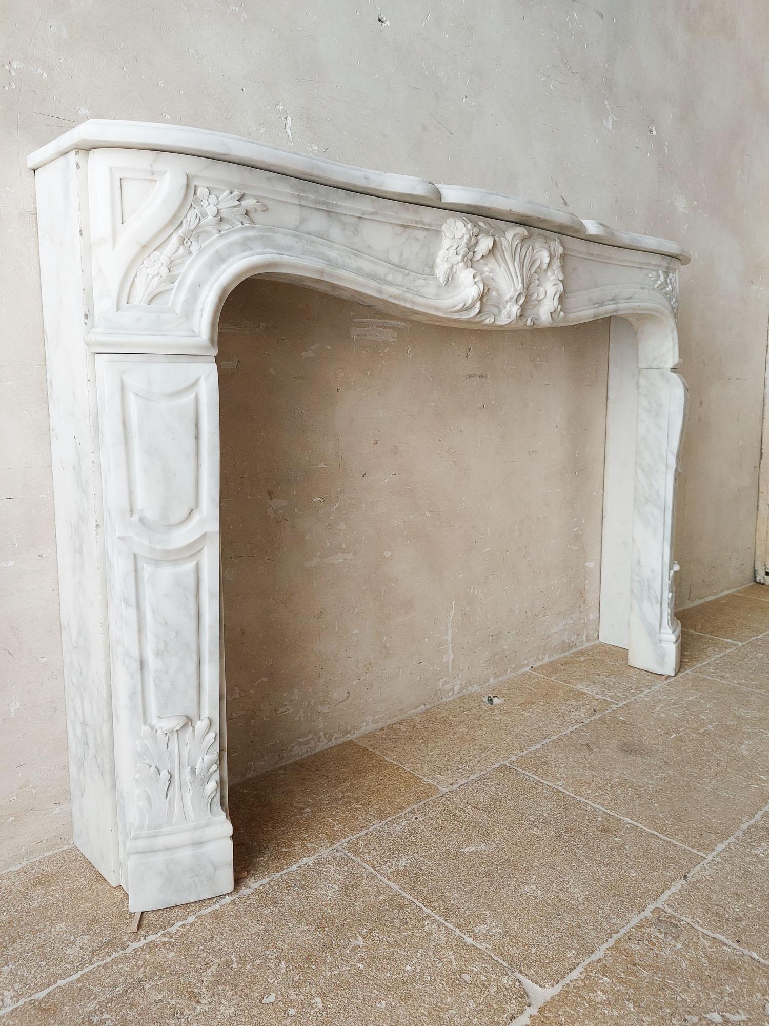 An Antique French Beautifully Carved Carrara Marble Fireplace with Coquille For Sale 3