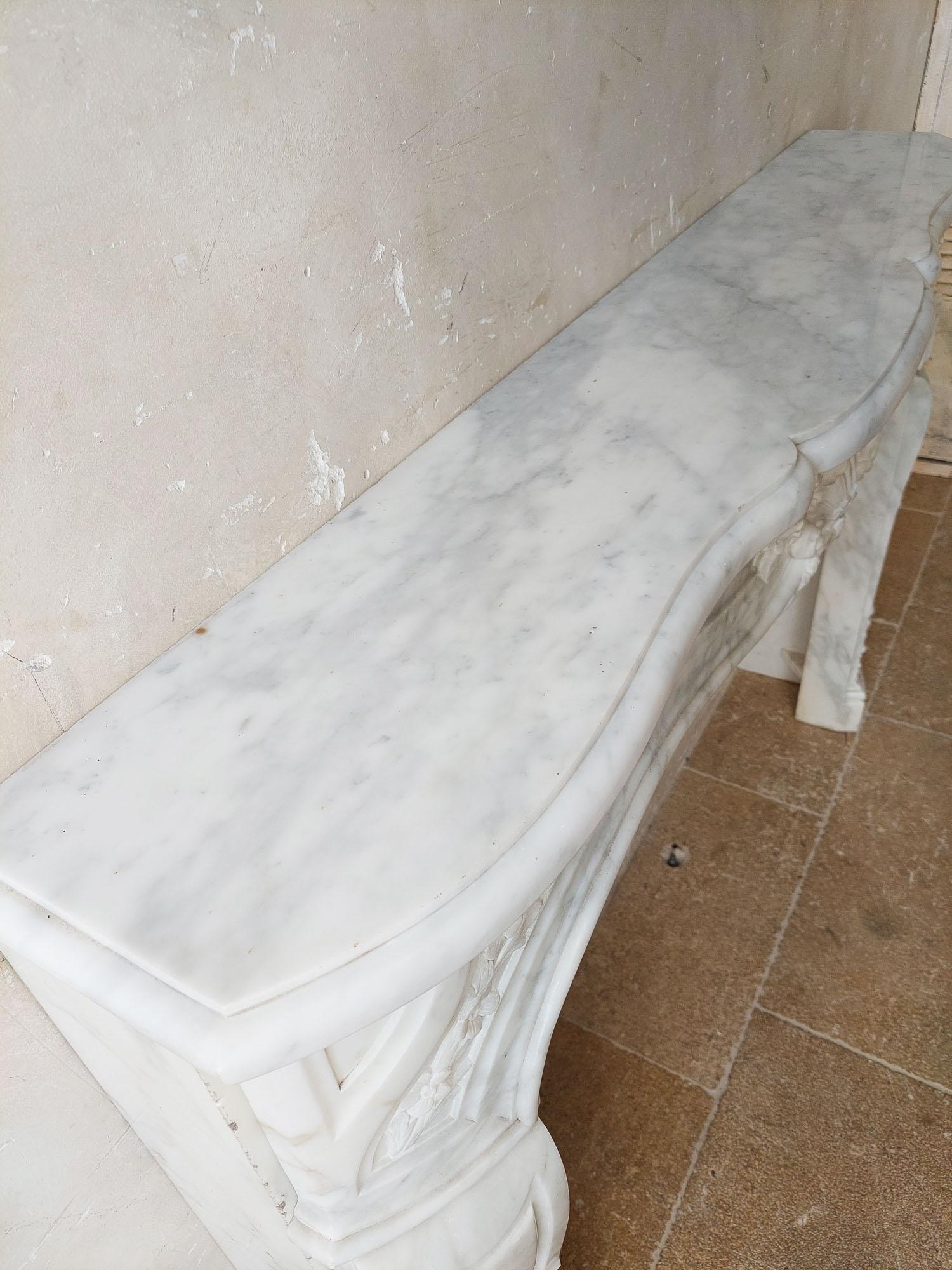 An Antique French Beautifully Carved Carrara Marble Fireplace with Coquille For Sale 4
