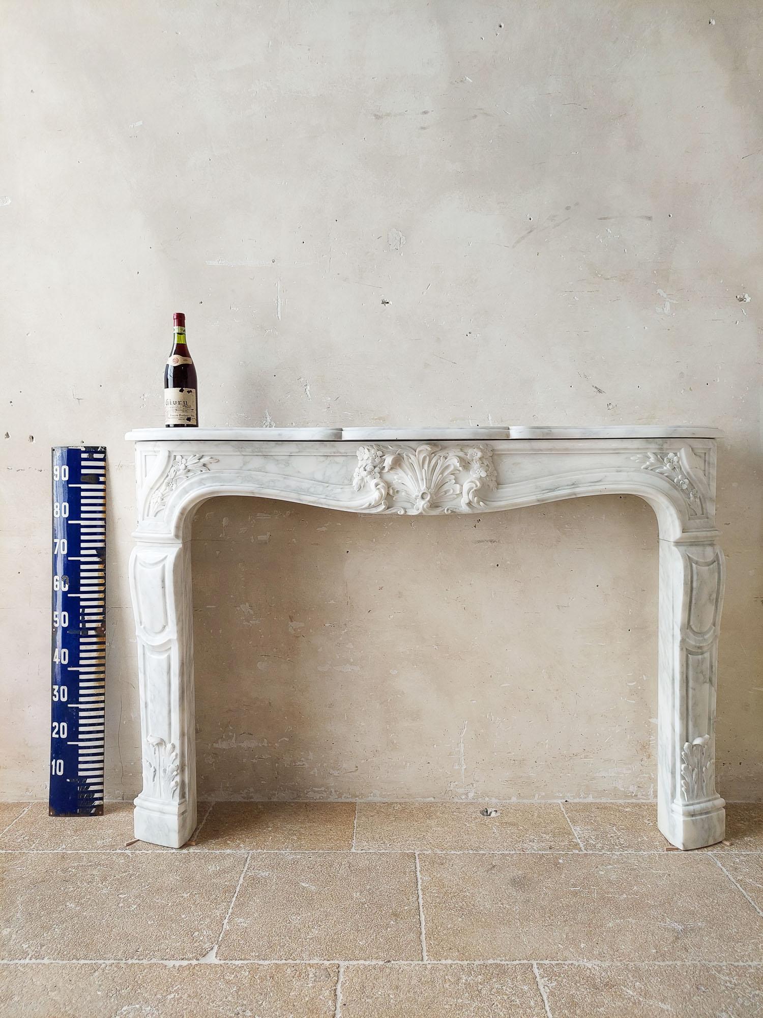An Antique French Beautifully Carved Carrara Marble Fireplace with Coquille For Sale 5