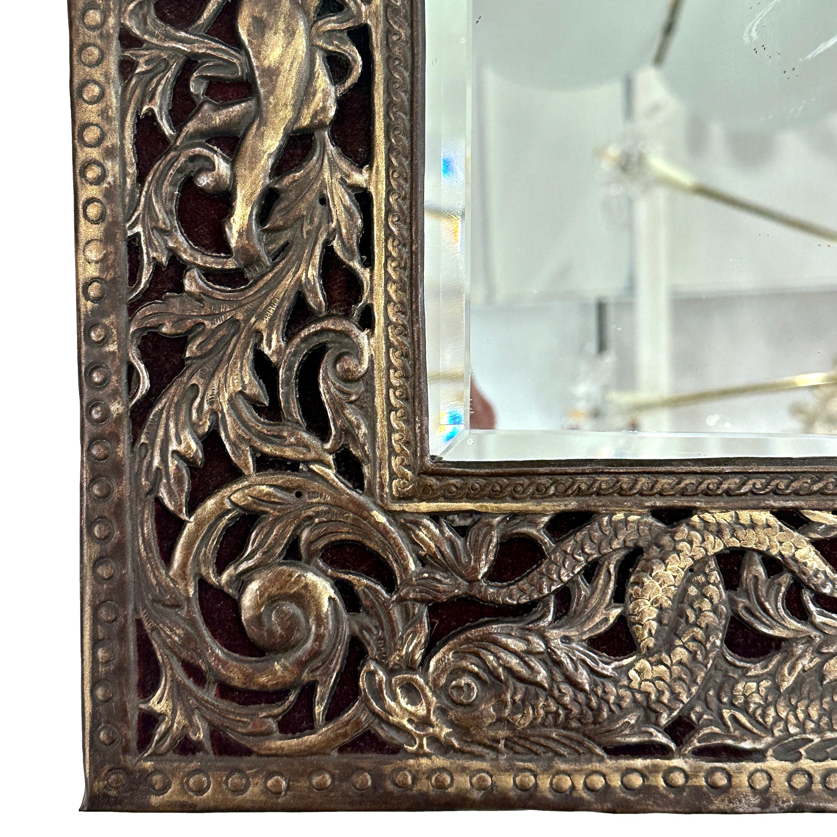 A circa 1900 French mirror with bronze applications, it can stand or hang.

Measurements:
Height: 17