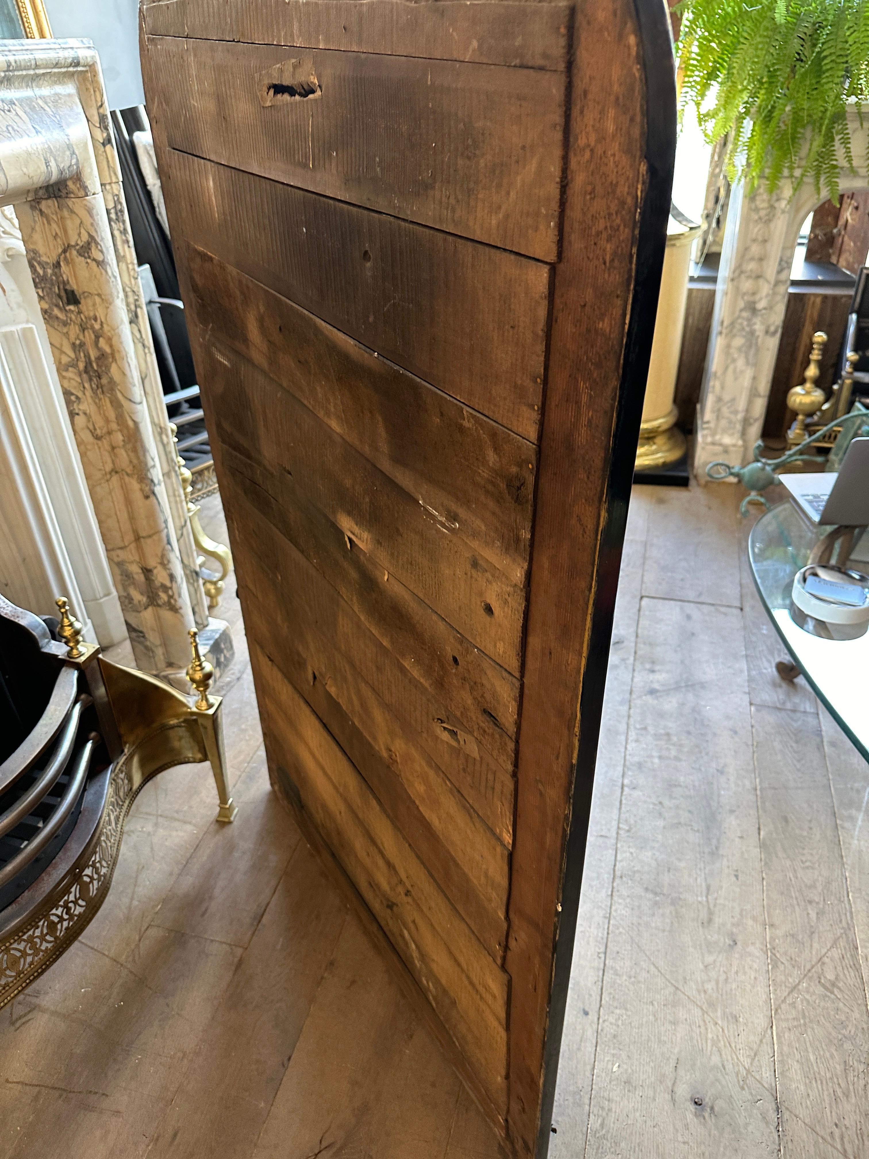 A Louis Philippe Ebonized domed toped mirror. The original mirror plate with some light foxing in areas. The ebonized frame decorated with Mother of Pearl inlay. Original boarded back. Images and video a true reflection of condition. 

French Circa
