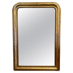 An Antique French Louis Philippe Domed Topped Gold Gilt Mirror