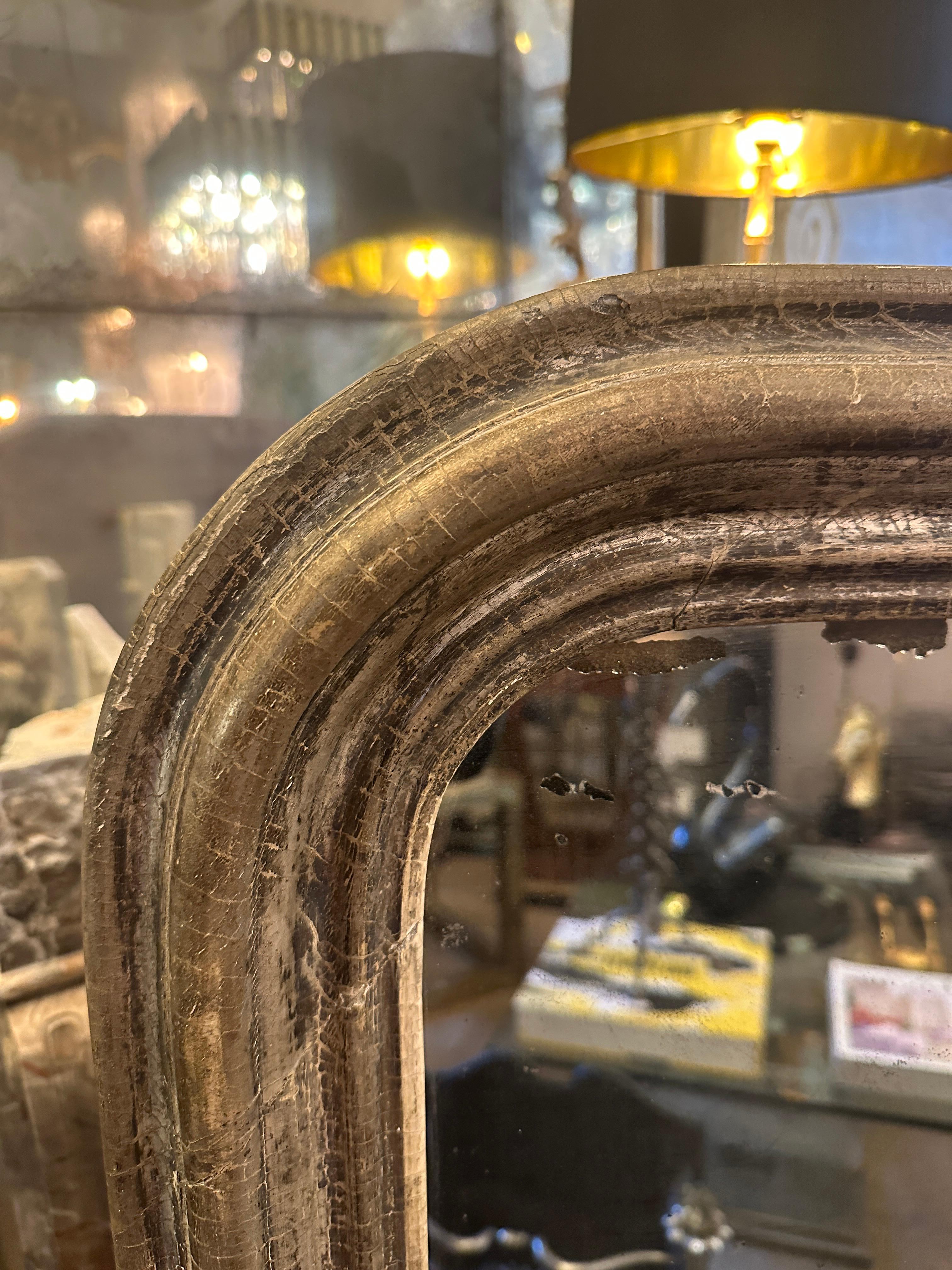 An Antique French Louis Philippe Silver Gilt Domed Topped Mirror In Fair Condition For Sale In London, GB