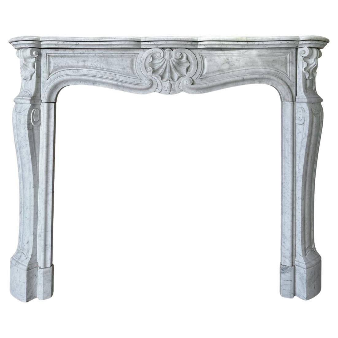 An Antique French Louis XV Marble Fireplace Mantel