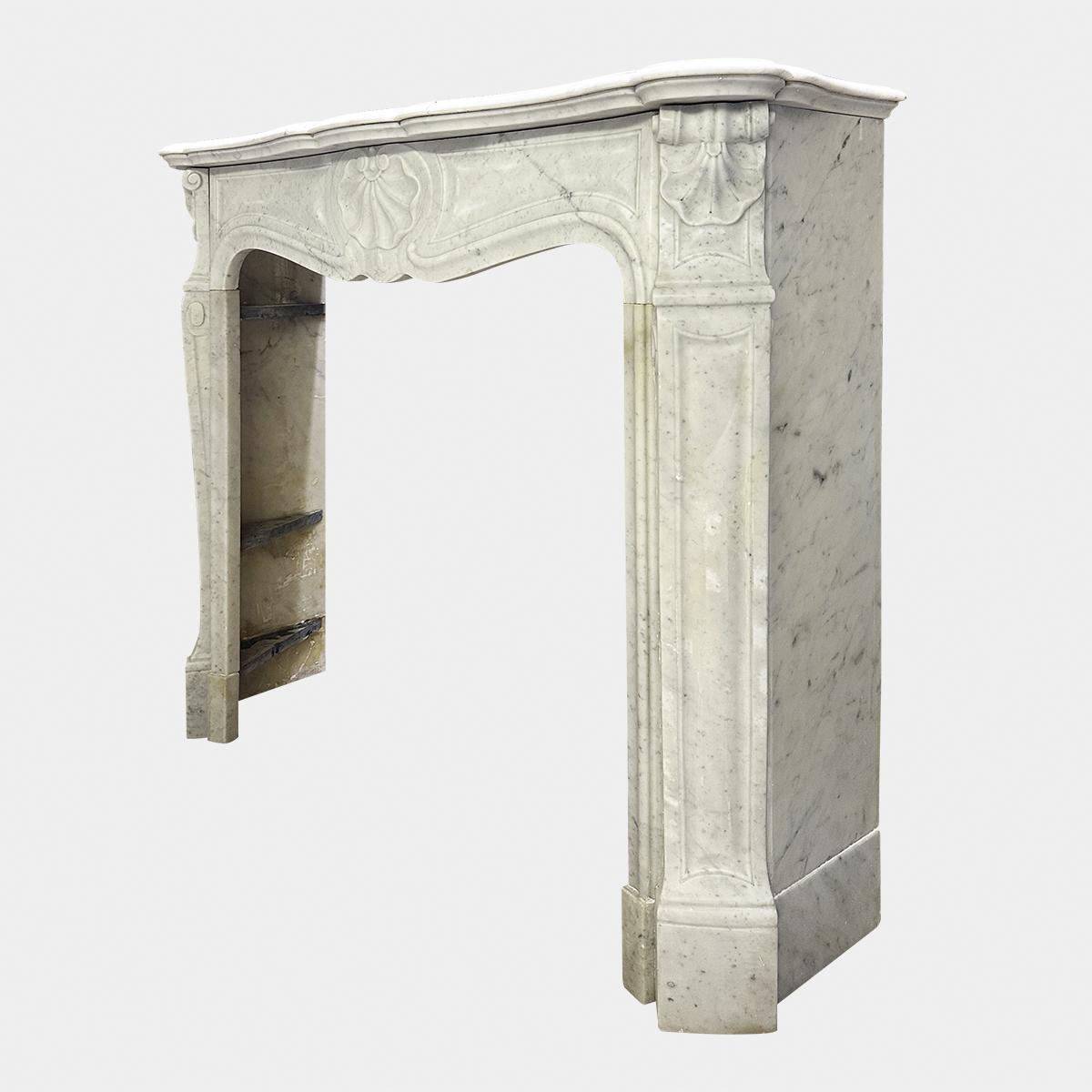 Hand-Carved An Antique French Louis XV Style Carrara Marble Fireplace Mantel  For Sale