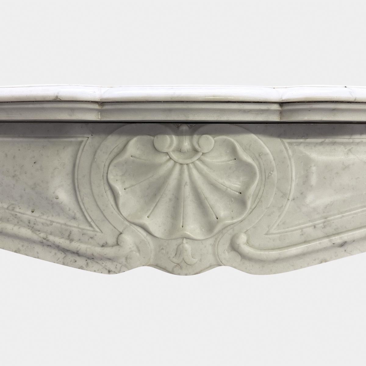 Mid-19th Century An Antique French Louis XV Style Carrara Marble Fireplace Mantel  For Sale