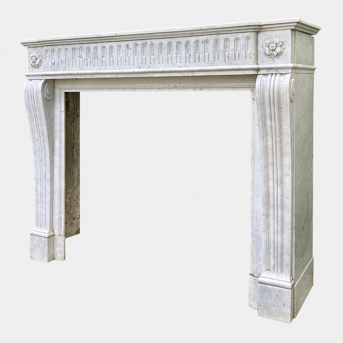 Hand-Carved An Antique French Louis XVI Style Carrara Marble Fireplace Mantel  For Sale