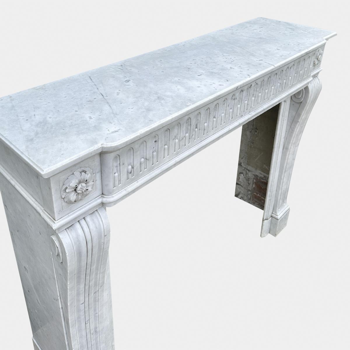 Mid-19th Century An Antique French Louis XVI Style Carrara Marble Fireplace Mantel 