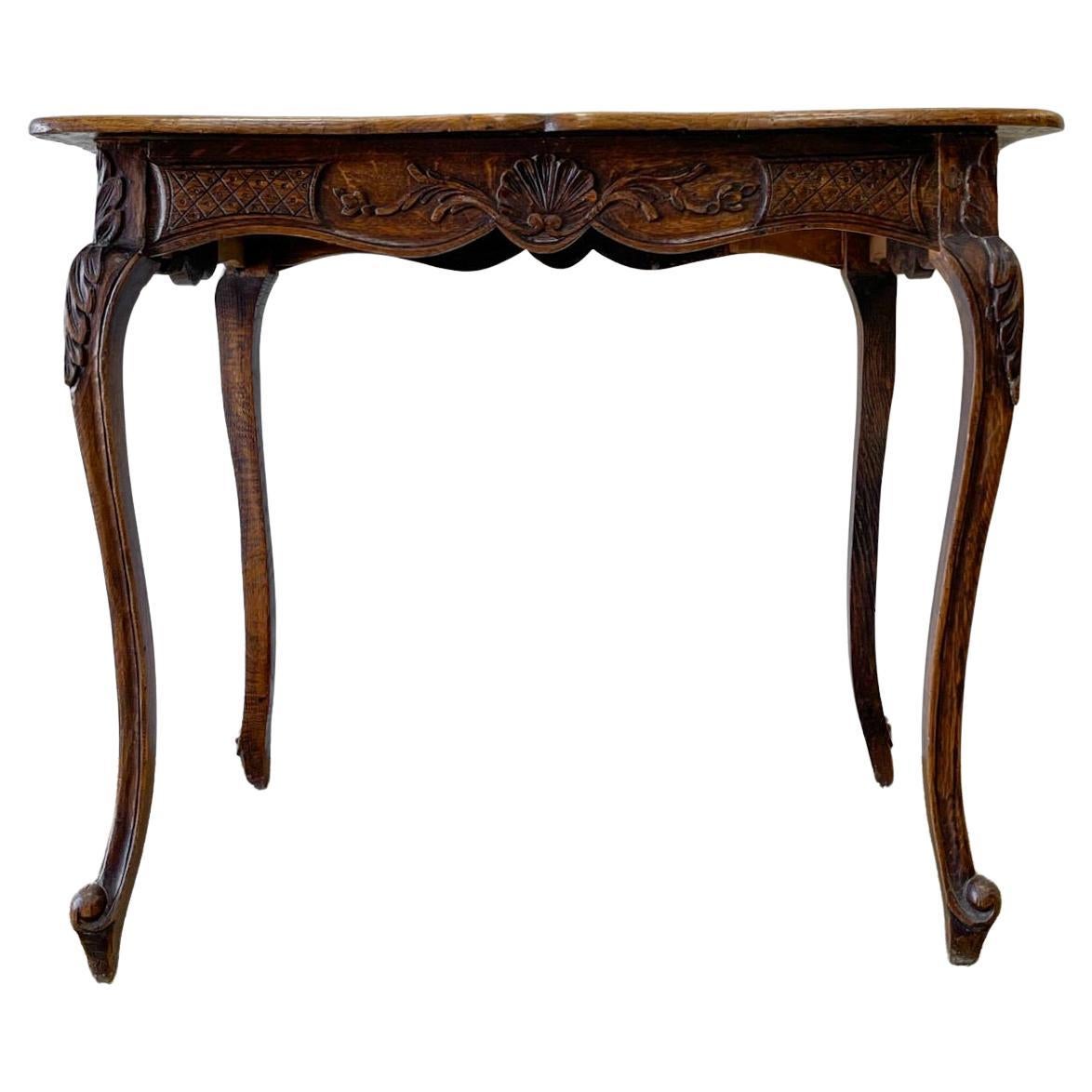 An Antique French Provincial Louis XV Oak Side Table For Sale