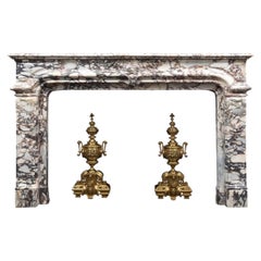 An antique French Régence style, Breccia Violetta marble mantel / fireplace