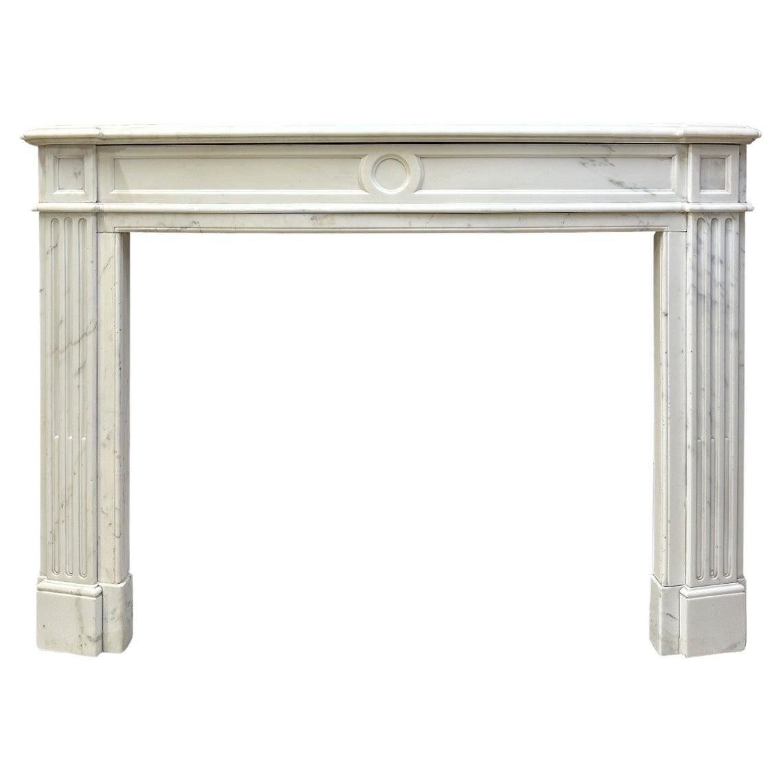 An Antique French Statuary White Marble Louis XVI Style Fireplace mantel For Sale
