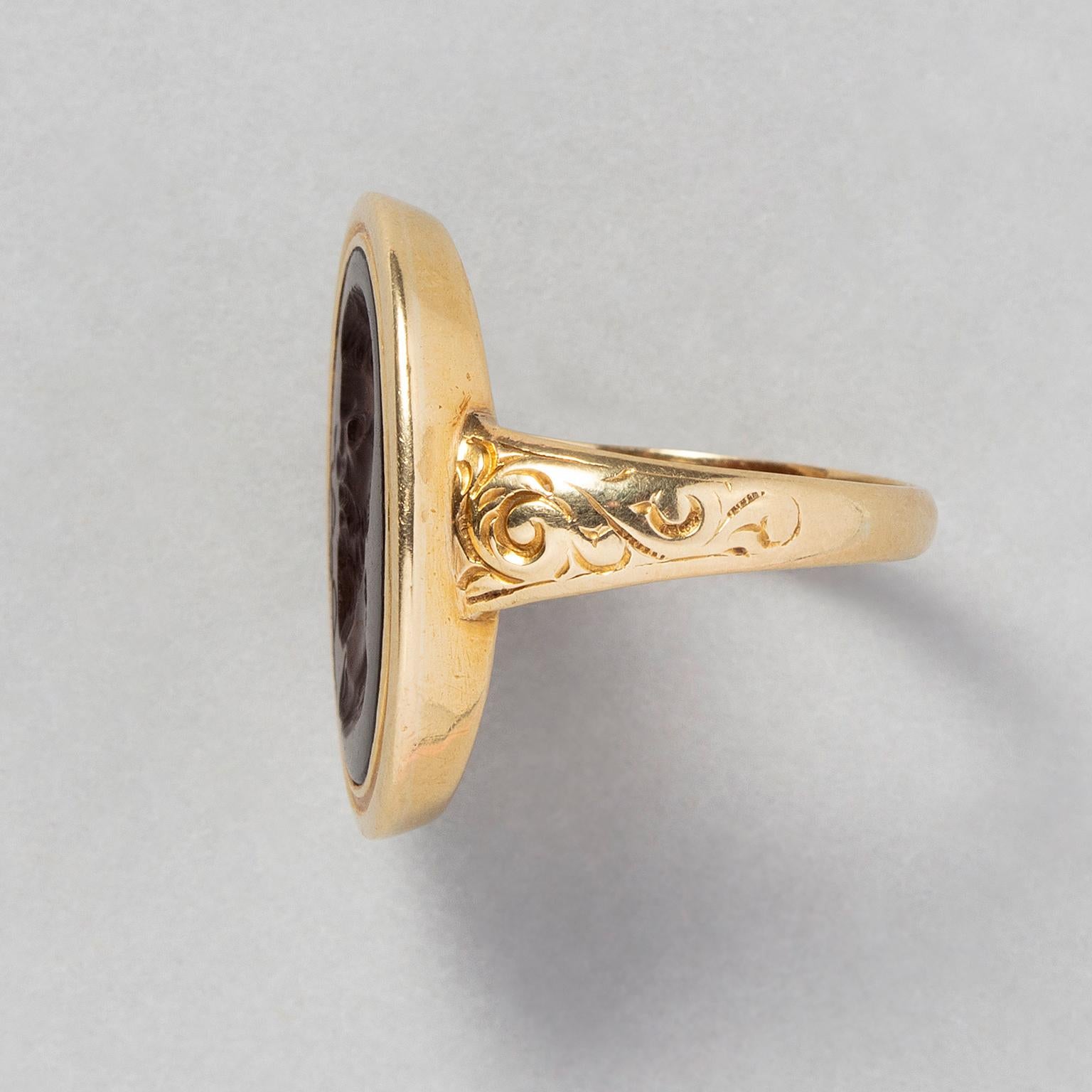 Uncut An Antique Gold Ring with an Intaglio of Asclepios For Sale