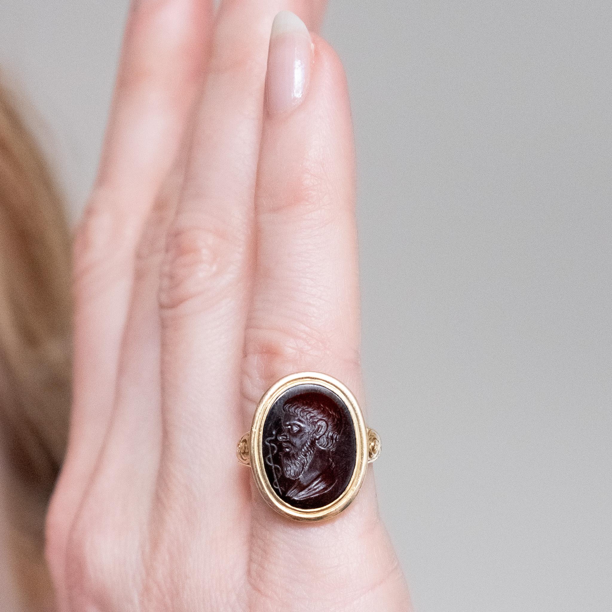 Women's or Men's An Antique Gold Ring with an Intaglio of Asclepios For Sale