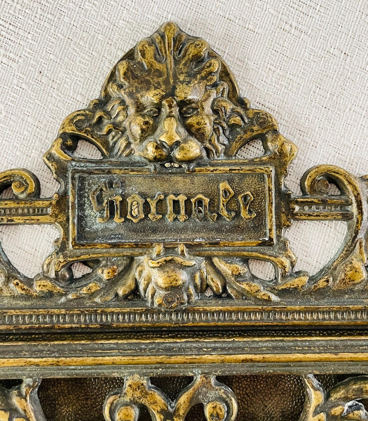An antique 19th century Gothic bronze wall or door Mail holder. The mail holder features a God figure , possibly God Odin in the middle , two screaming figures on each side of the mail holder. Two winged angels above the God on each side. The top
