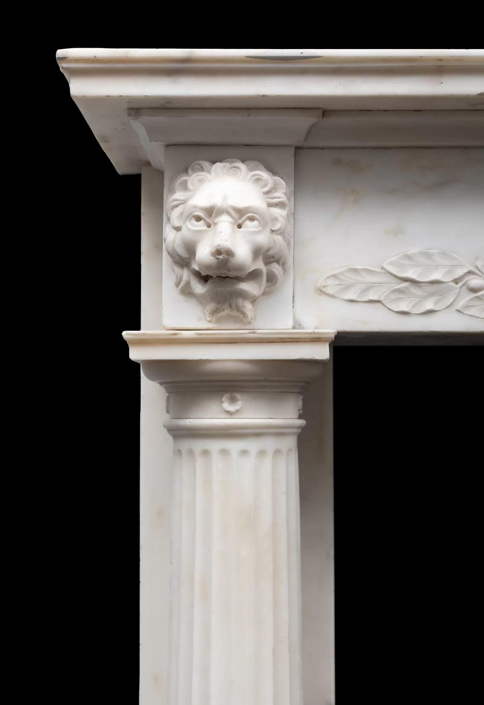 An antique late 18th/ early 19th century Italian Statuary marble mantlepiece of fine quality
Small in scale and beautifully made in Italy around the year 1800.

The exquisitely carved frieze depicting an elliptical urn with eagle headed handles and