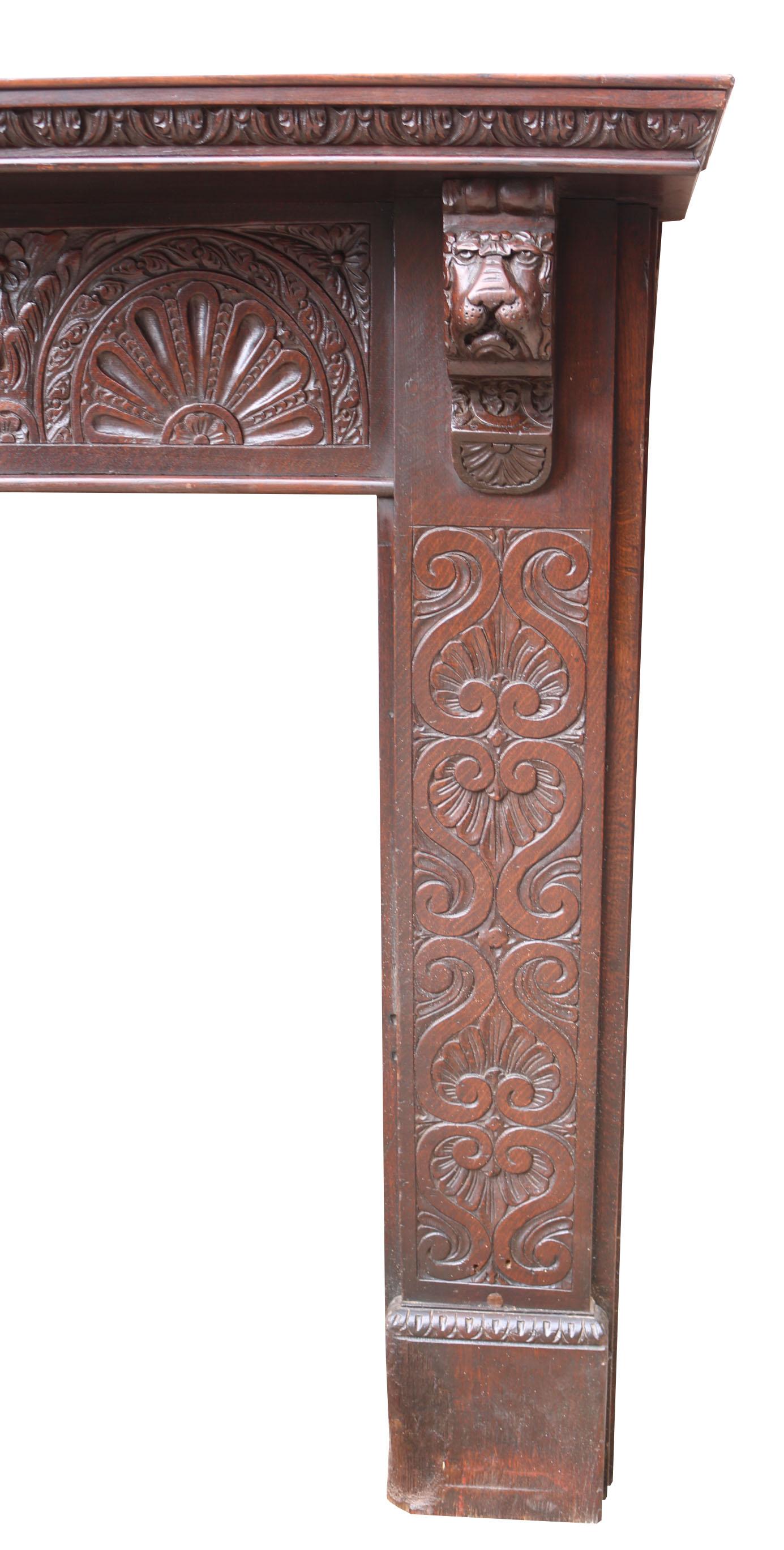 19th Century Antique Jacobean Style Carved Oak Fire Surround For Sale