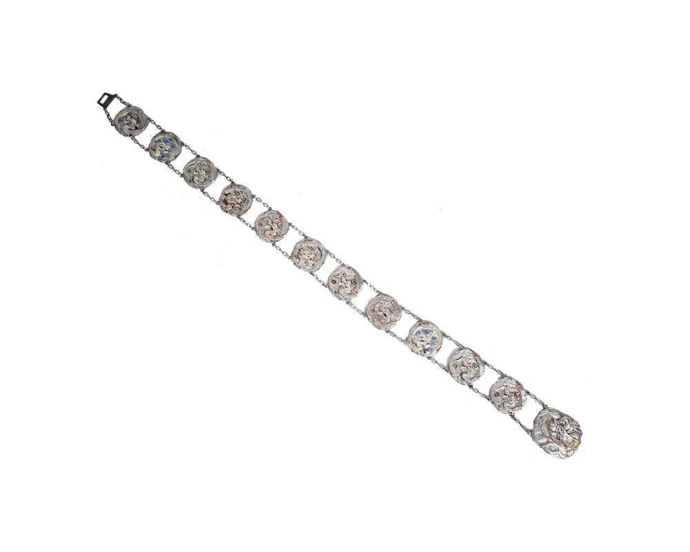 An antique Japanese Meiji period repousse silver belt consisting of buckles link In Good Condition In New York, NY